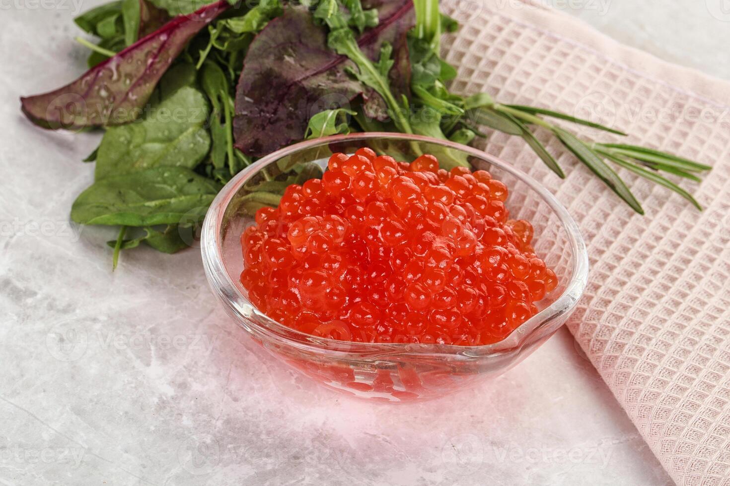 Red caviar in the bowl photo