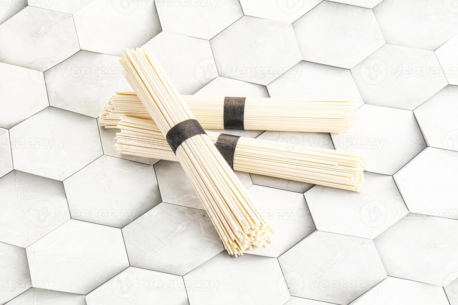 Raw asian udon noodle for cooking photo