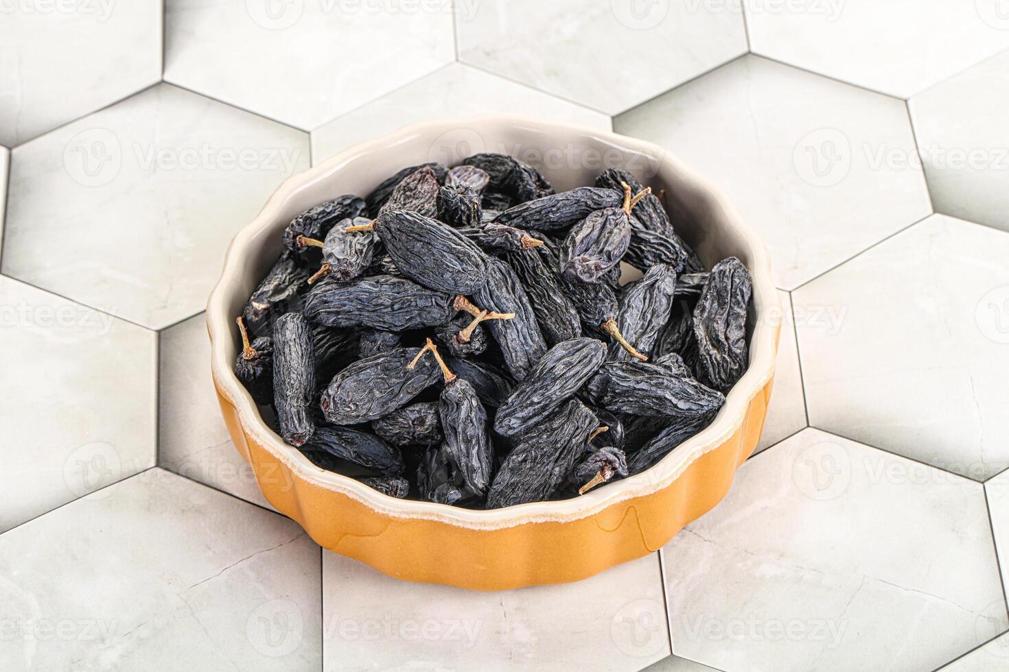 Blue raisin - dry grape berries photo