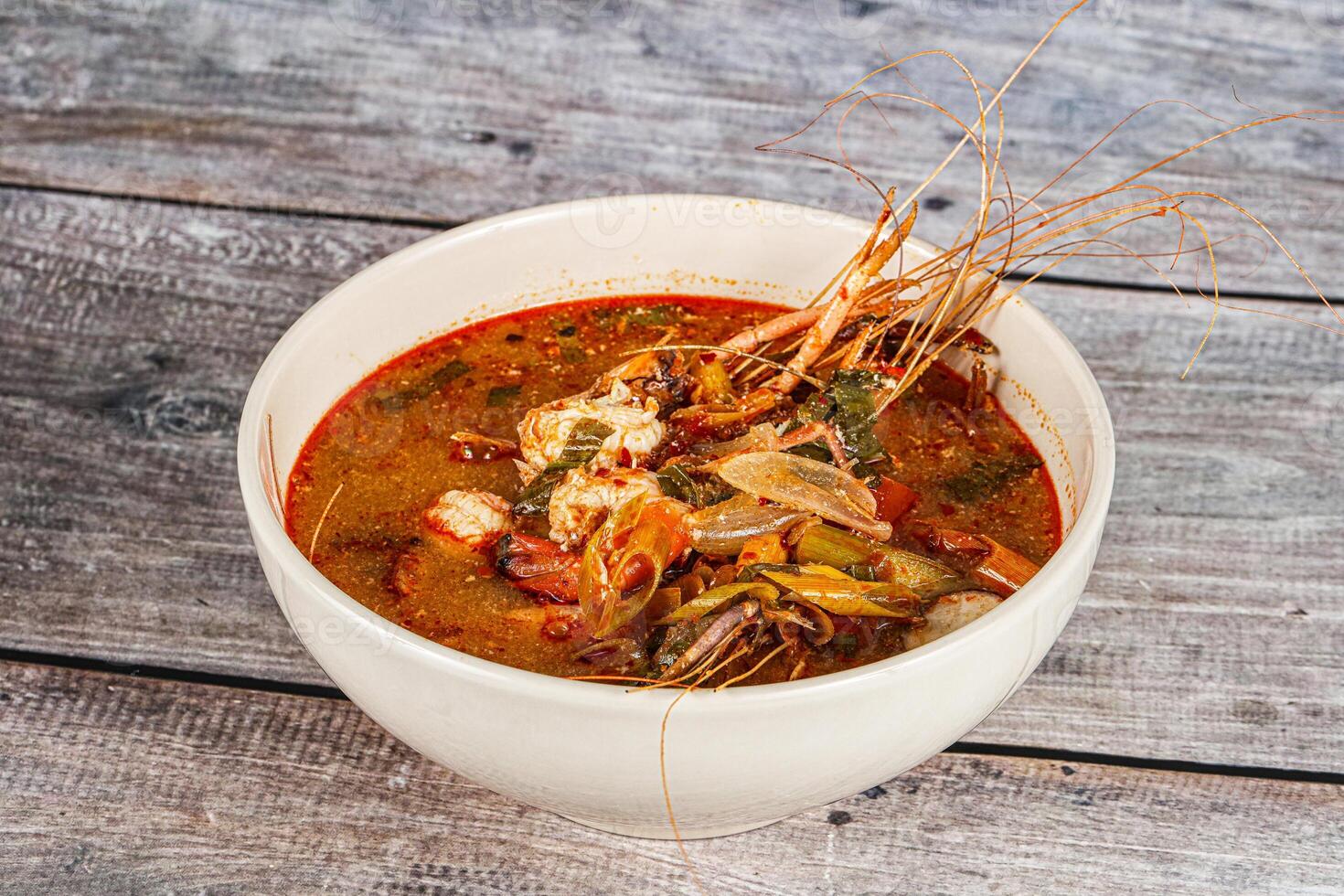 Thai traditional cuisine - Tom Yum soup photo