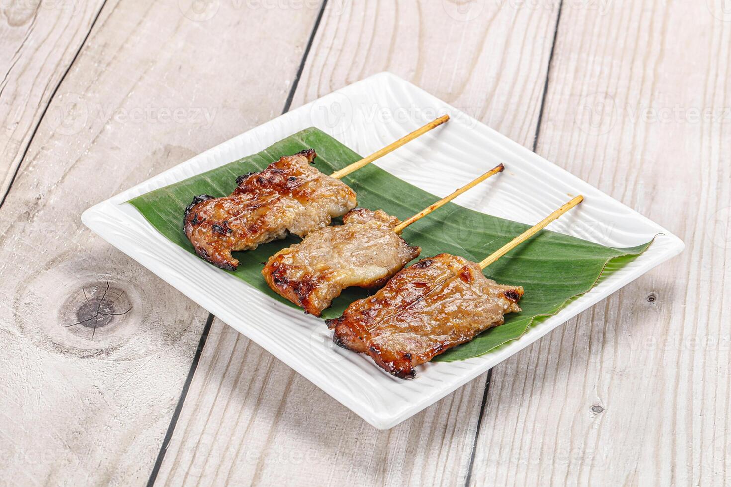 Thai cuisine - grilled pork skewer photo
