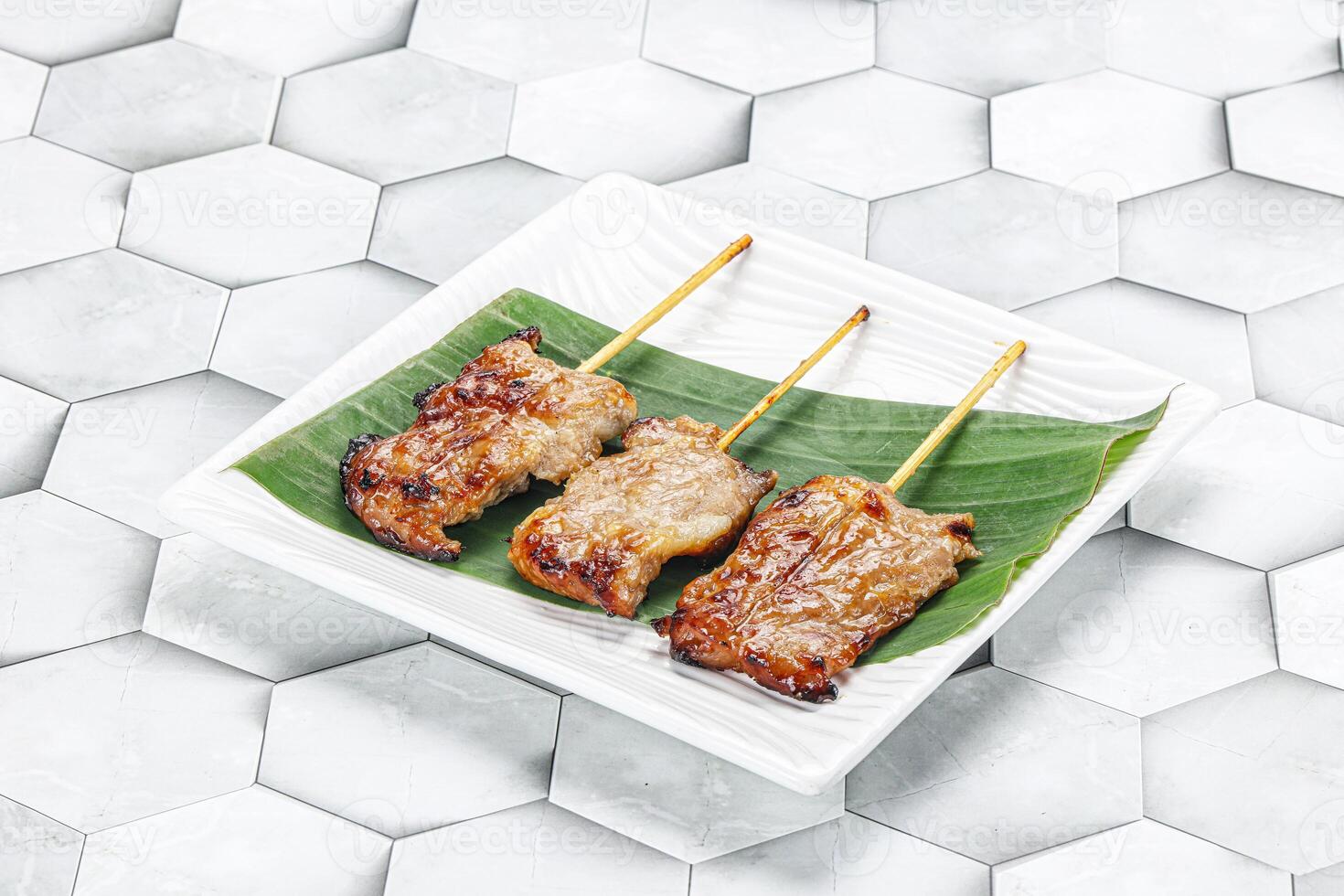 Thai cuisine - grilled pork skewer photo