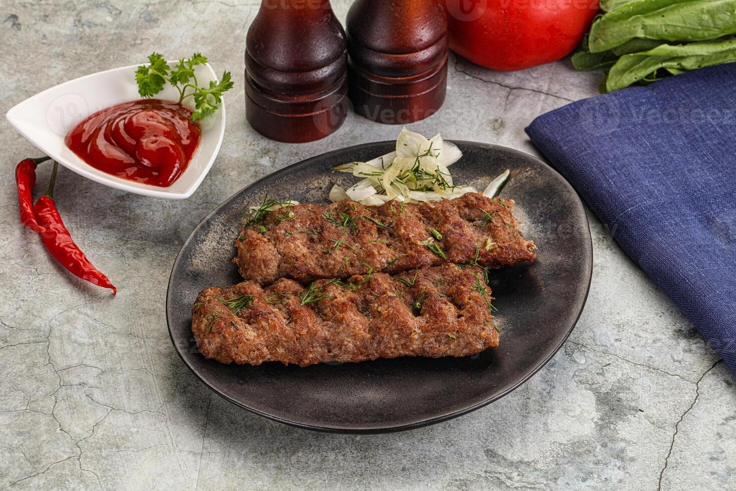 Kebab with beef served onion photo