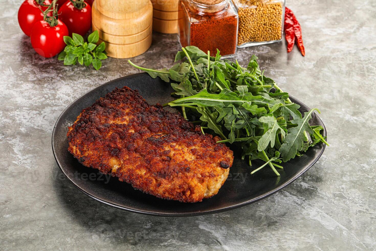 Tasty roasted breaded meat schnitzel photo