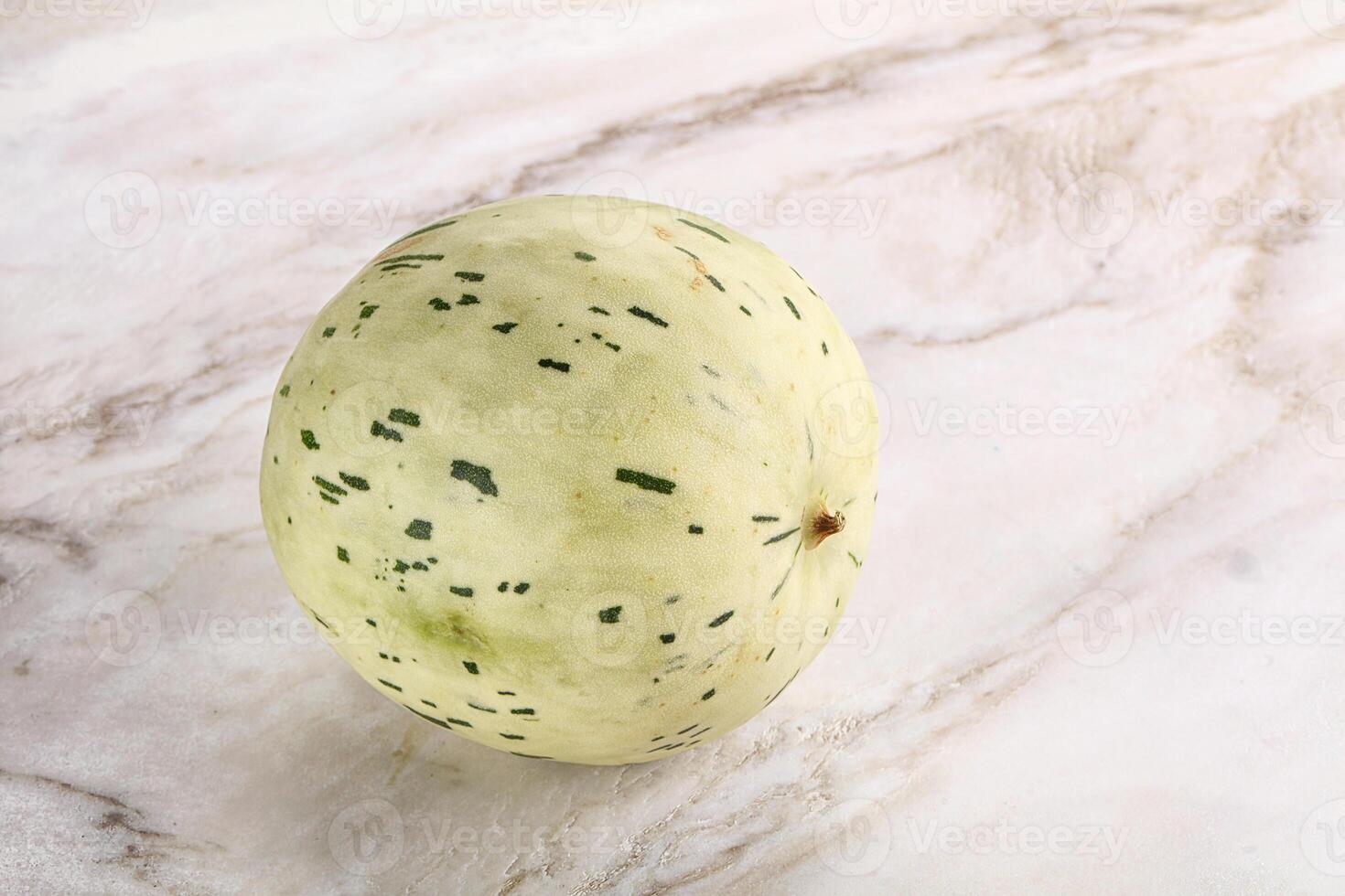 Ripe sweet juicy Dalmatin melon photo