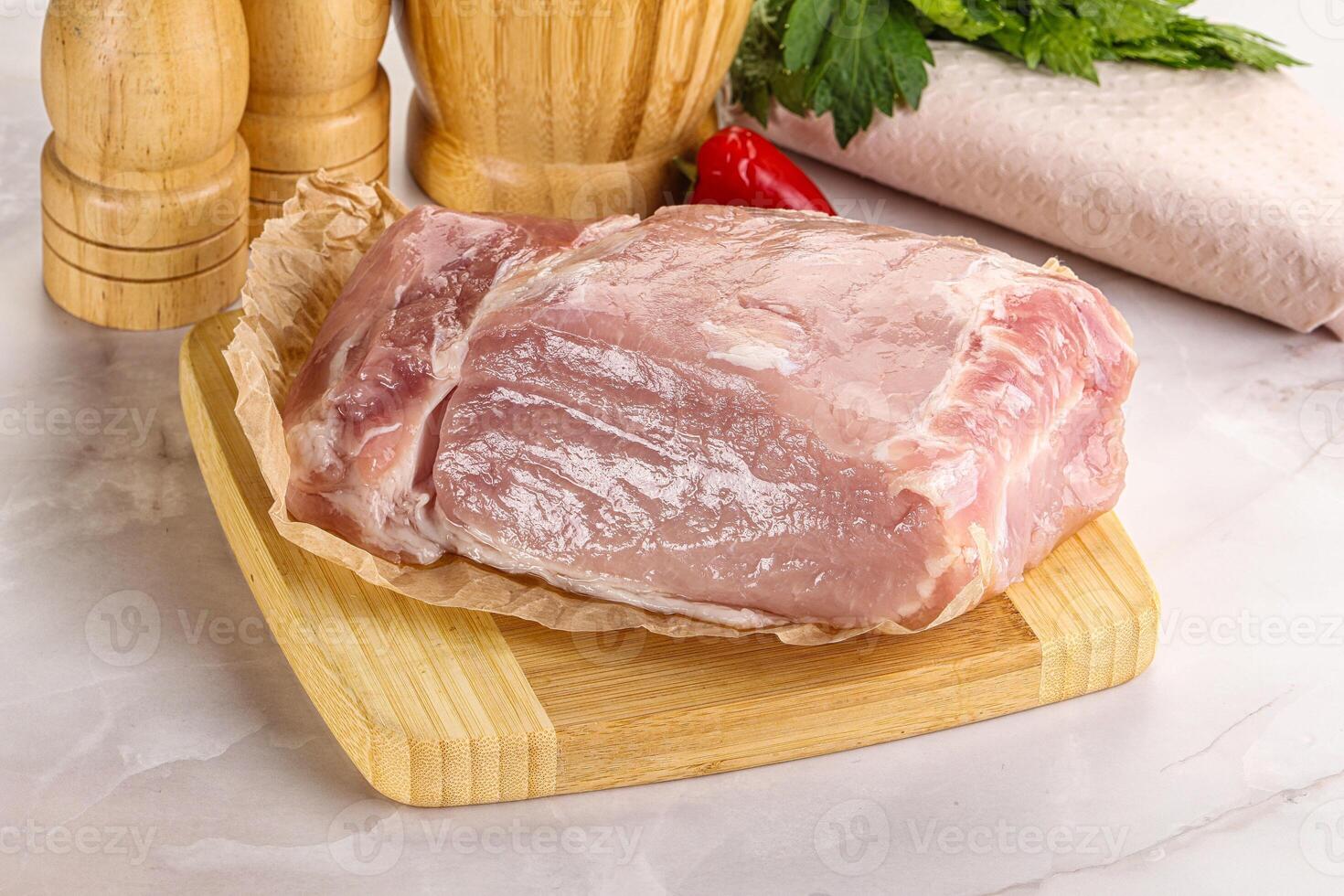 Raw uncooked pork meat loin photo