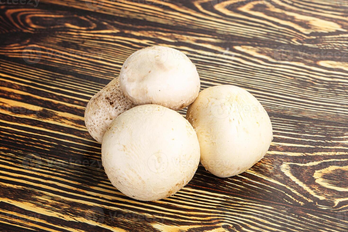 Natural organic ripe champignon mushrooms photo