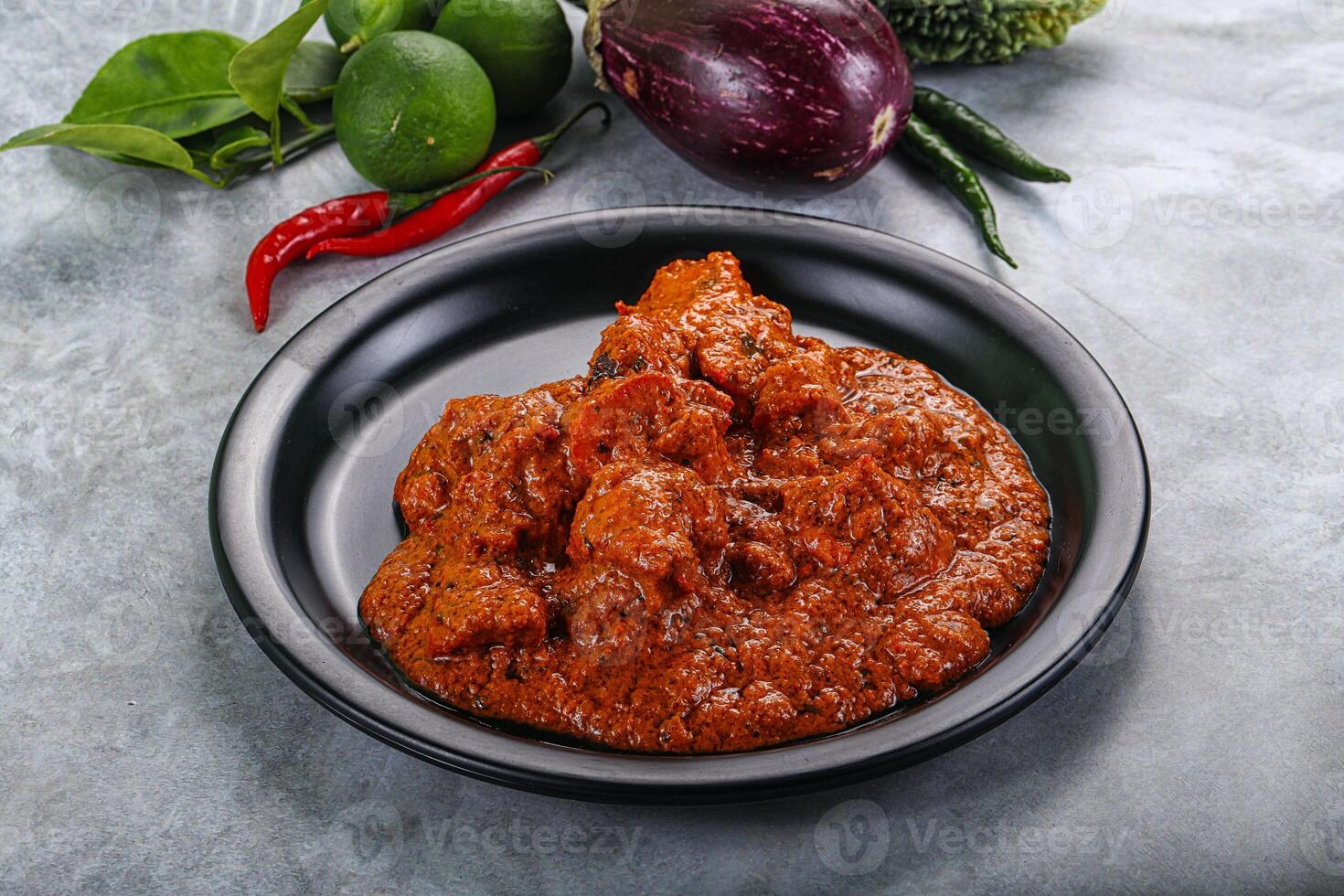 Indian cuisine - butter chicken with sauce photo