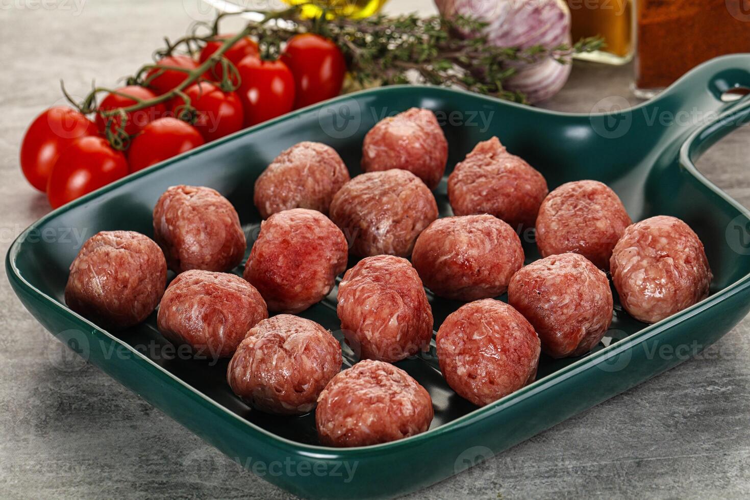 Uncooked raw beef meatball minced photo
