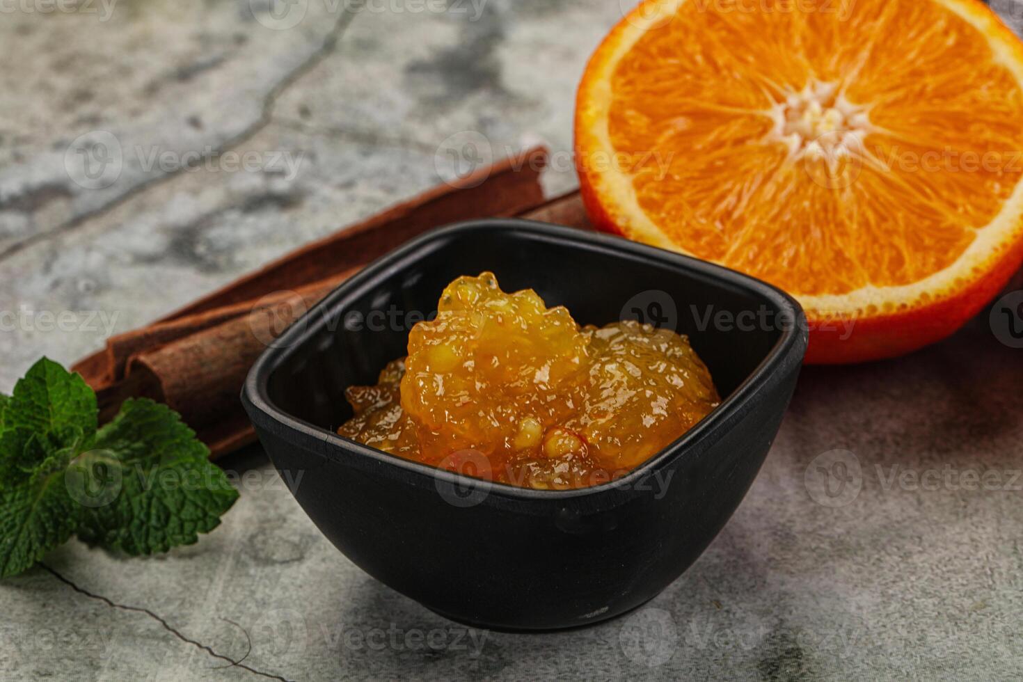 Tasty homemade Orange jam in the bowl photo