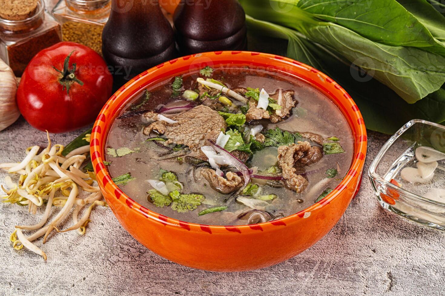 Vietnamese cuisine - Pho Bo soup with beef photo