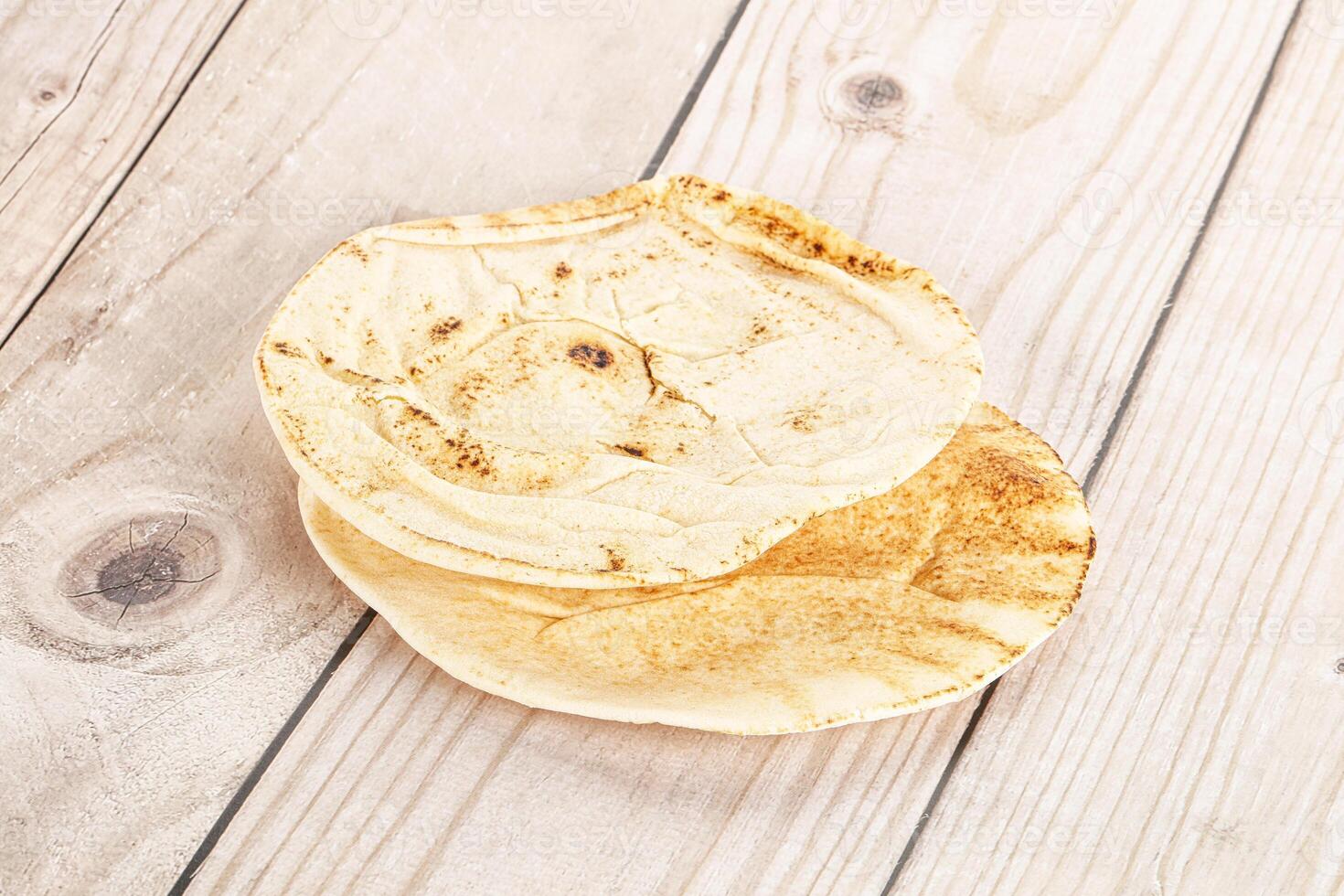 Traditional eastern round pita bread photo