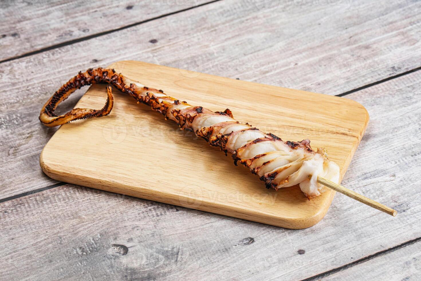 Delicous tasty Grilled octopus tentacle photo
