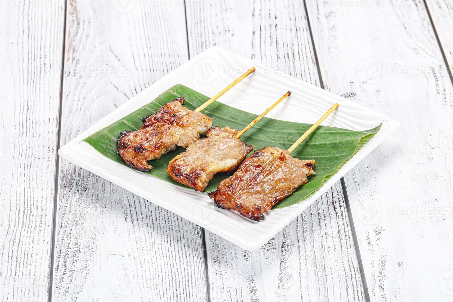 Thai cuisine - grilled pork skewer photo