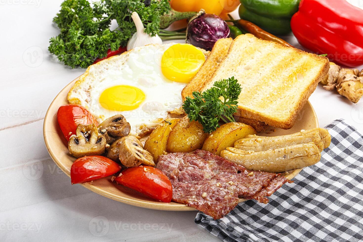 English breakfast with toast, egg and sausages photo
