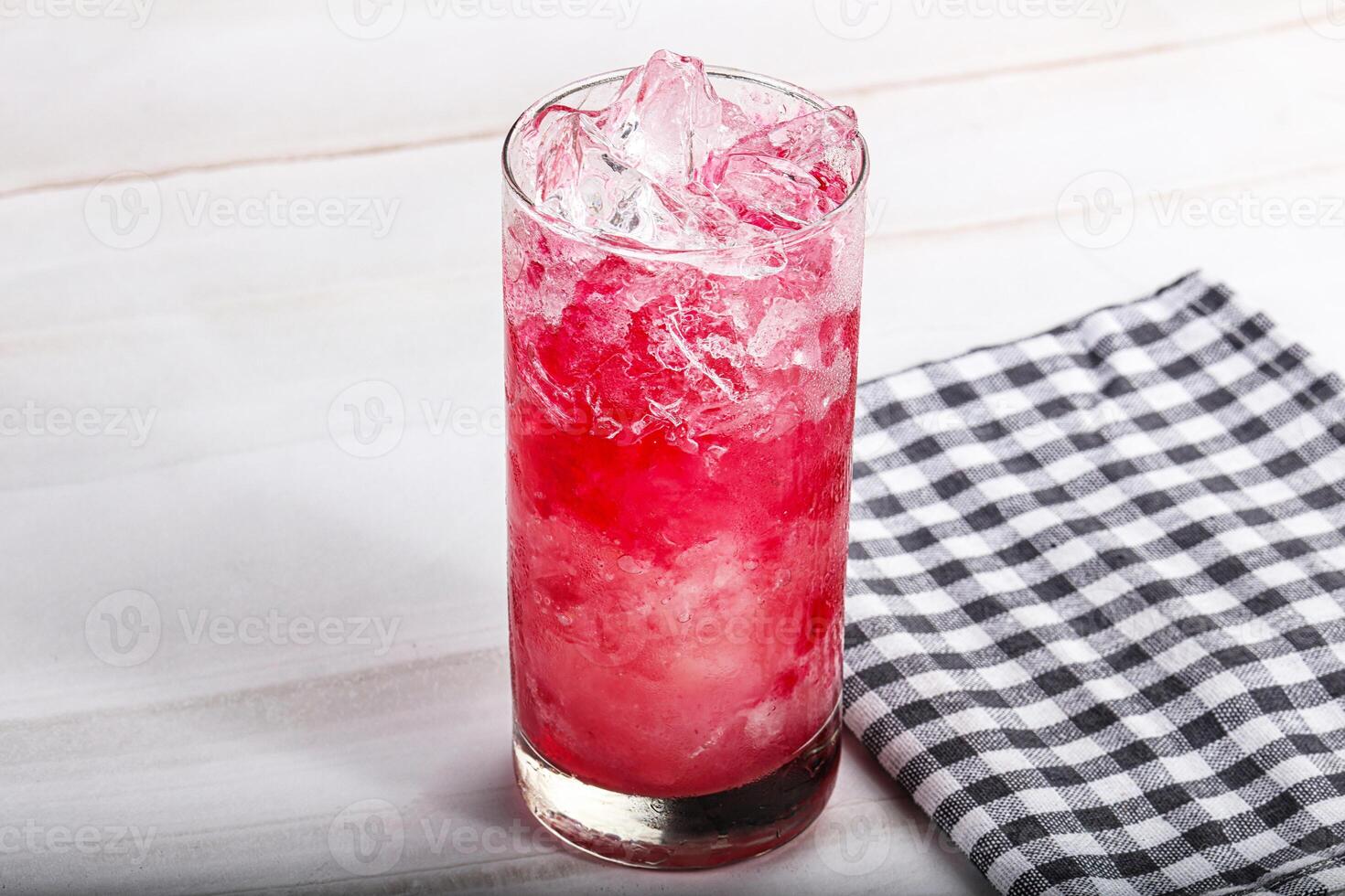 Cold strawberry cocktail with ice photo