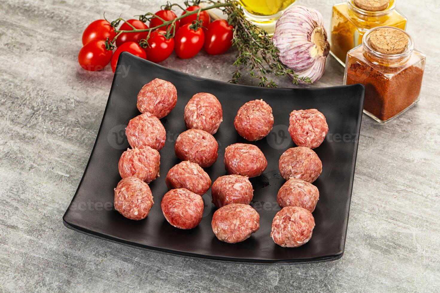 Uncooked raw beef meatball minced photo