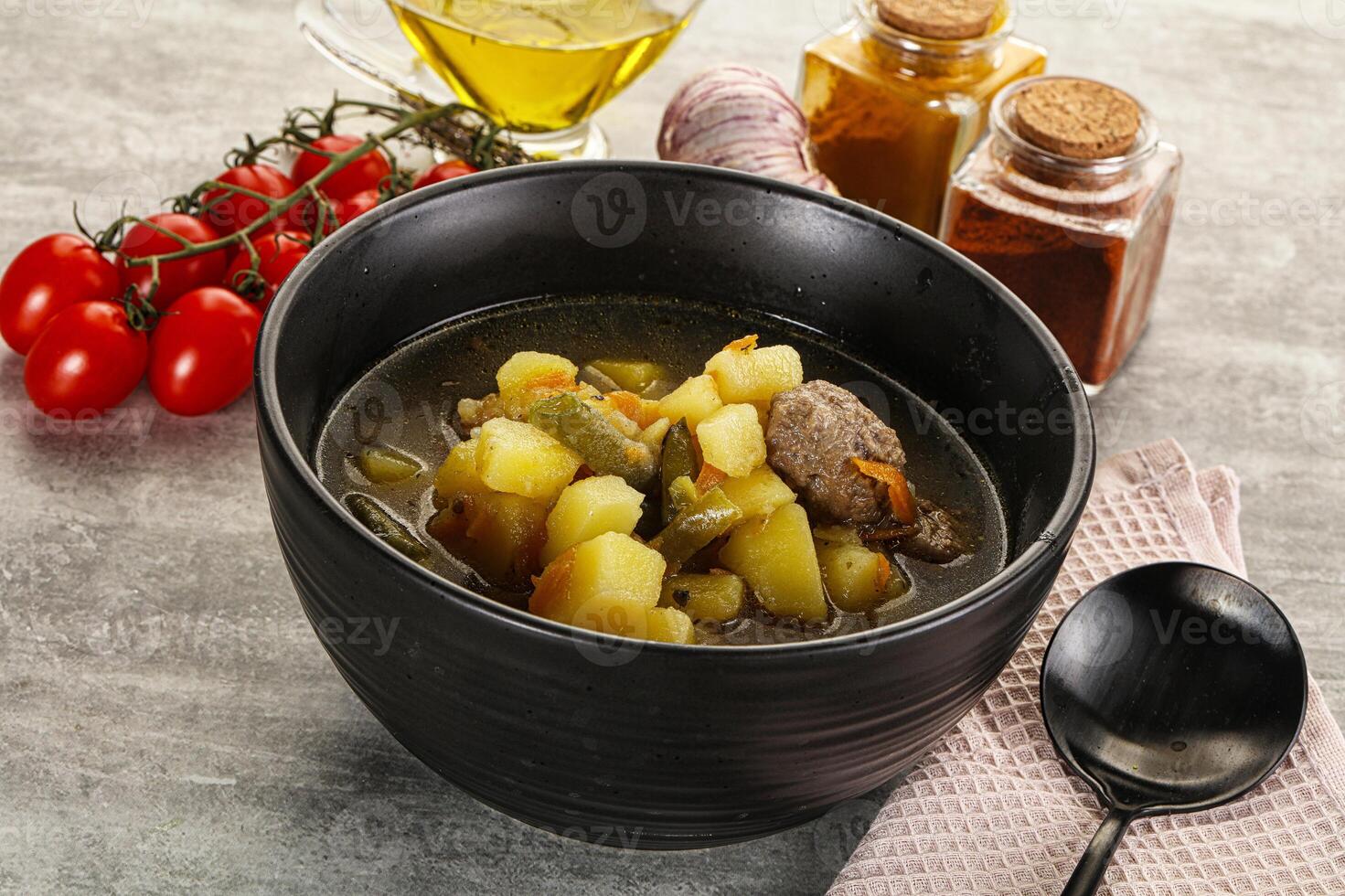 Soup with meatball and potato photo