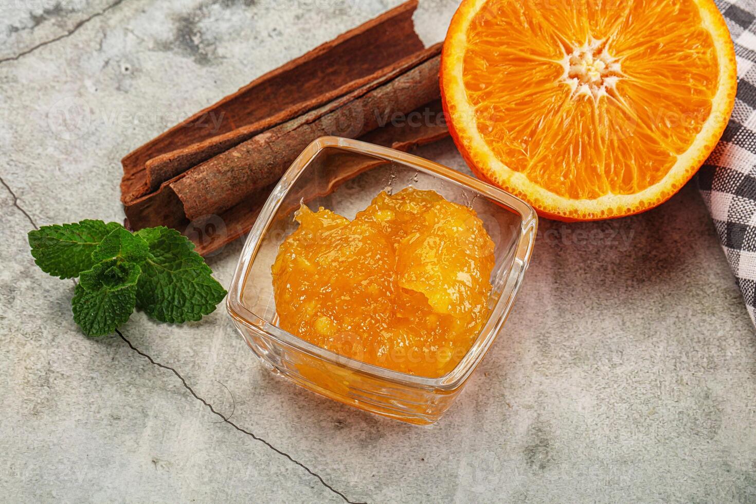 Tasty homemade Orange jam in the bowl photo