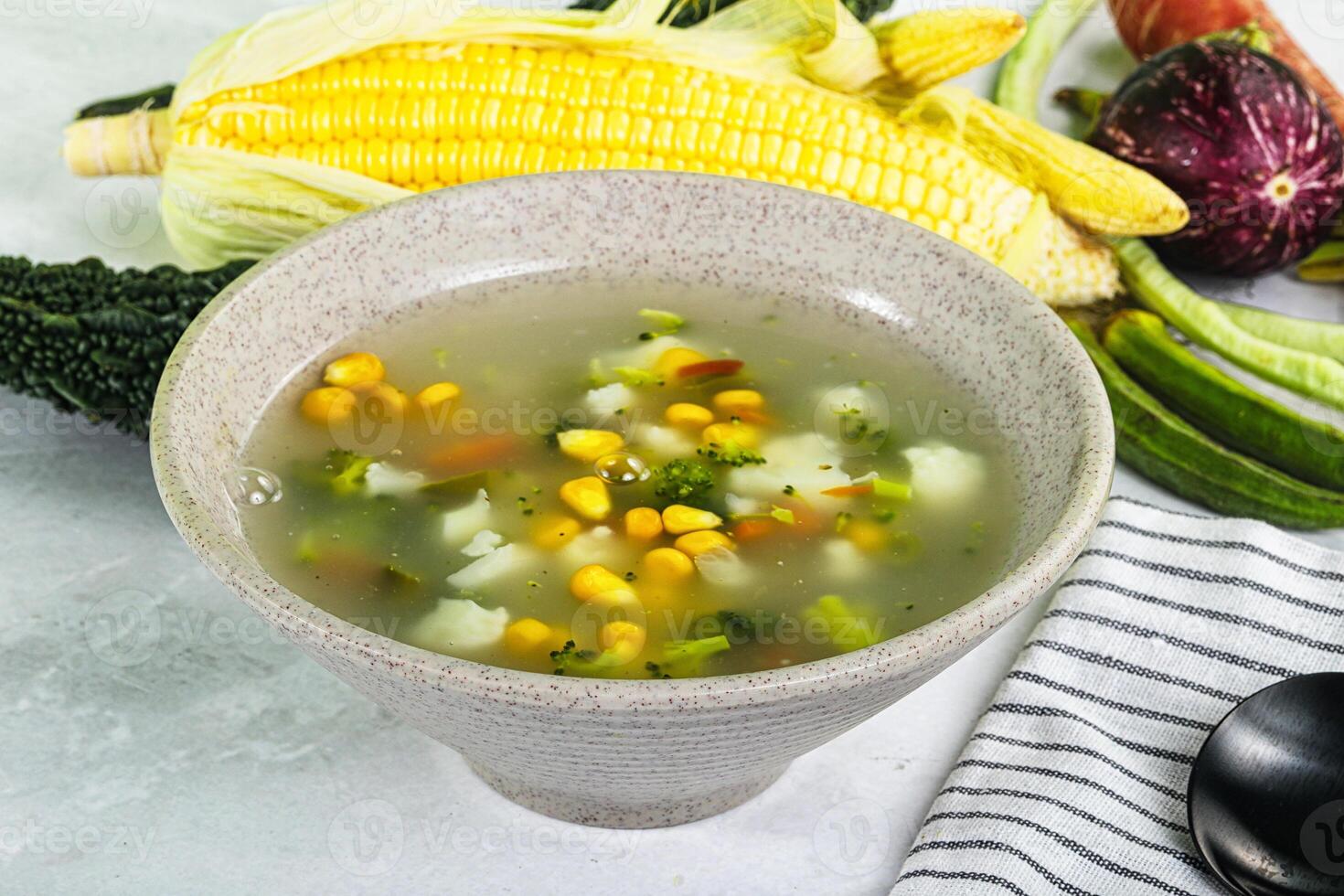 Soup with corn and broccoli photo