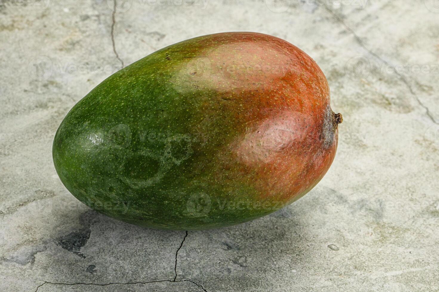 Sweet juicy green and red mango photo
