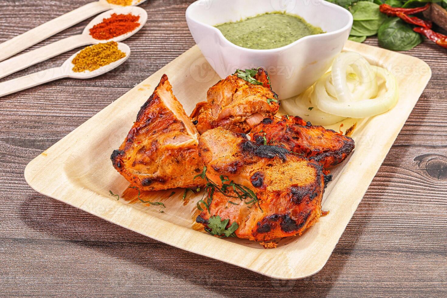 Indian cuisine - tandoori chicken tikka photo