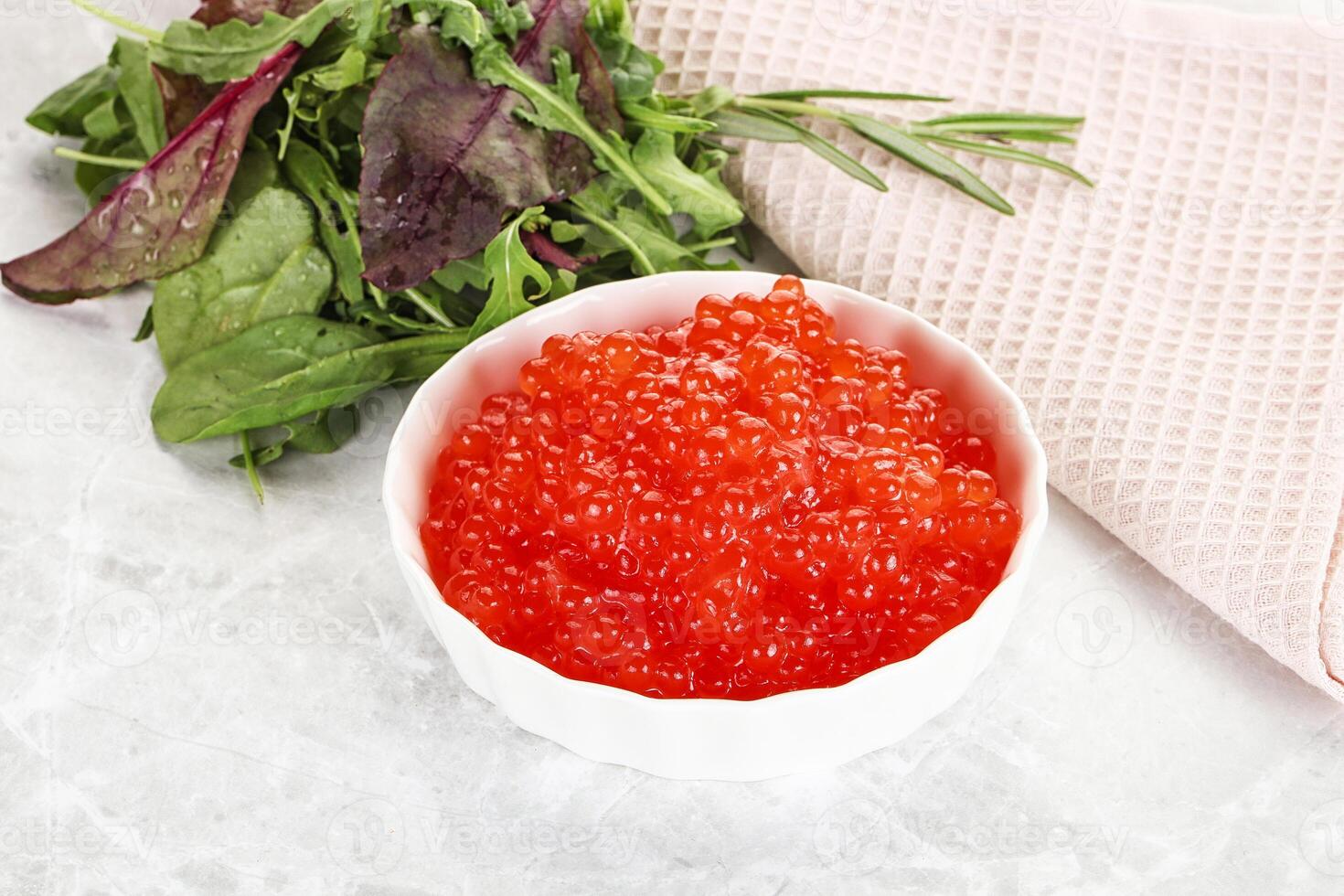 Red caviar in the bowl photo