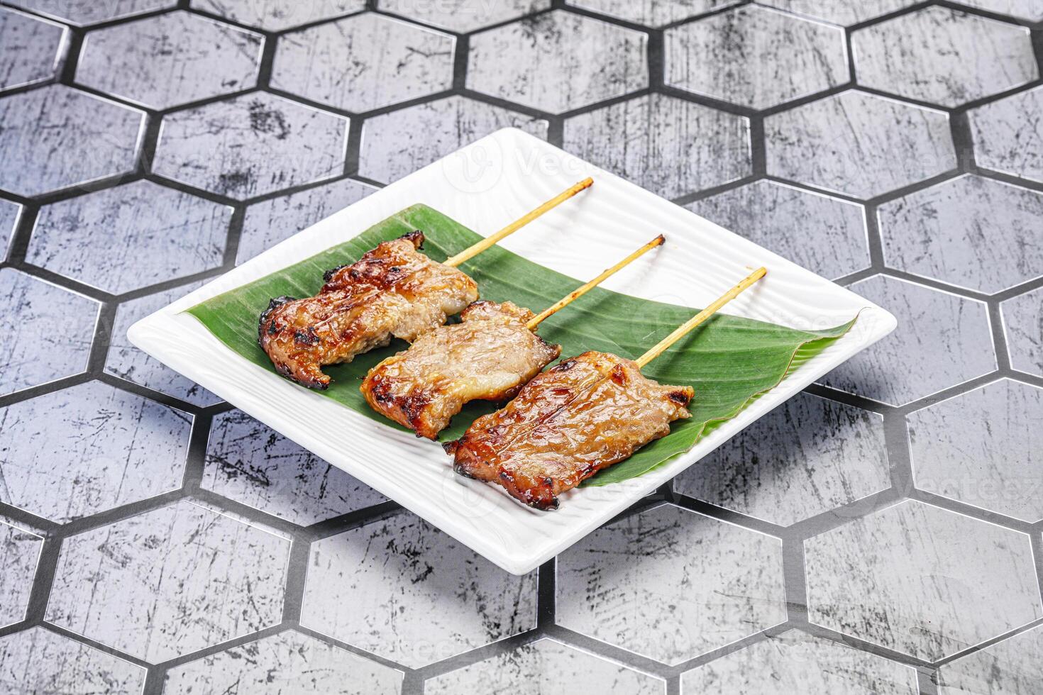 Thai cuisine - grilled pork skewer photo