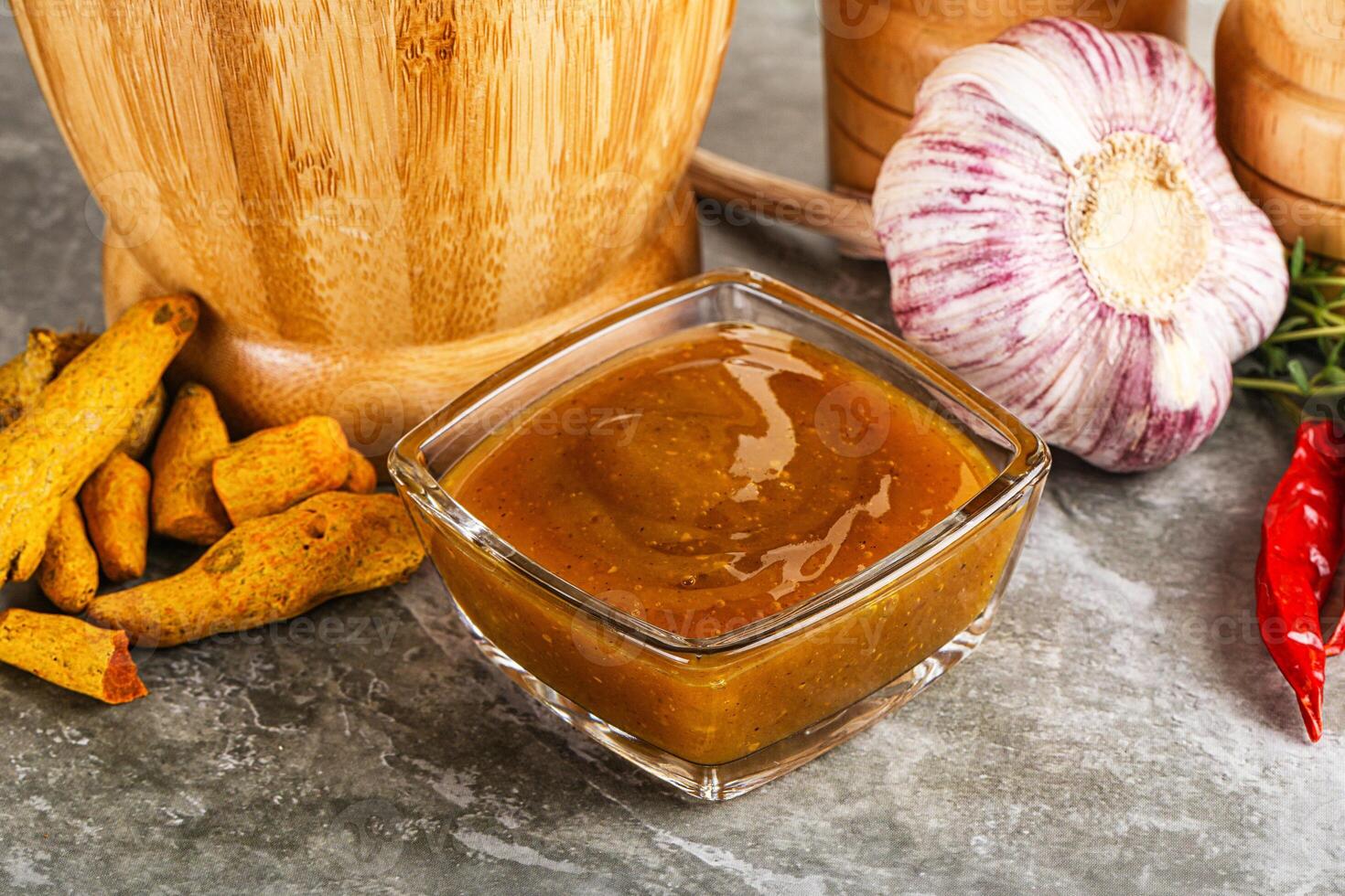 Indian curry sauce in the bowl photo
