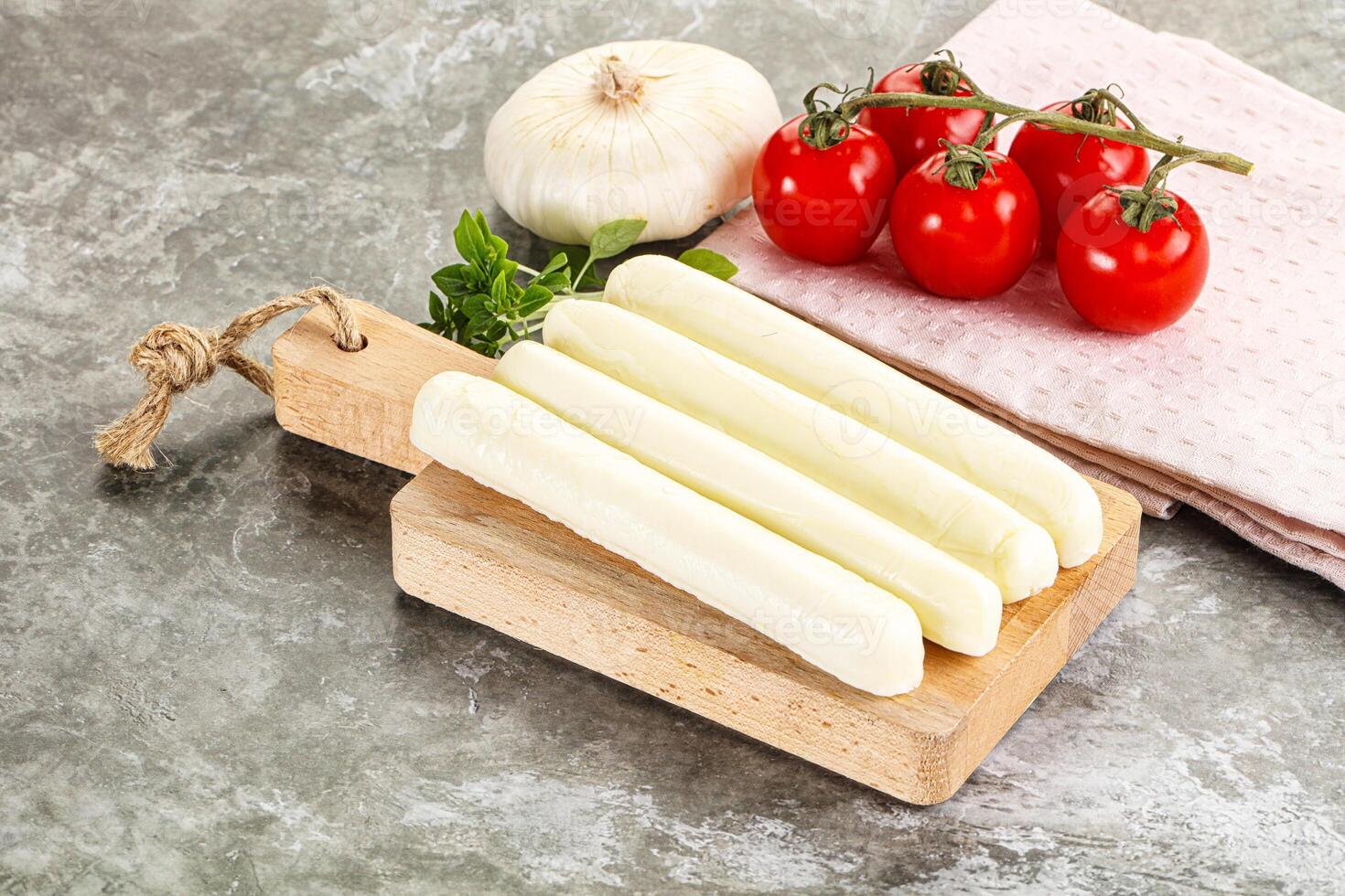 Mozzarella cheese stick heap snack photo