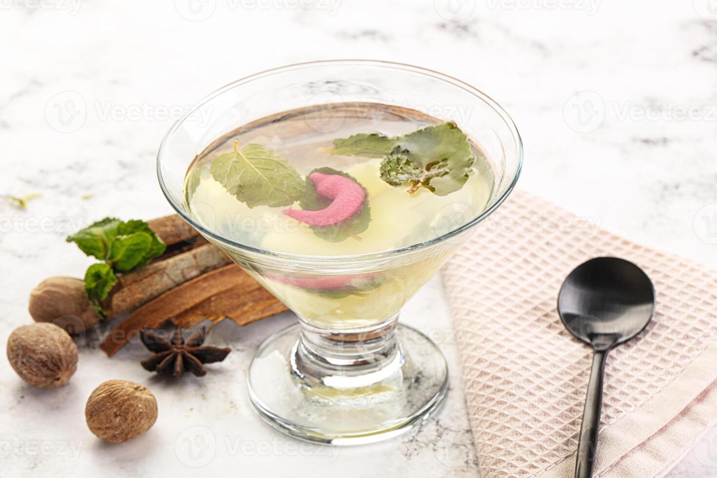 Sweet pineapple jelly with mint photo