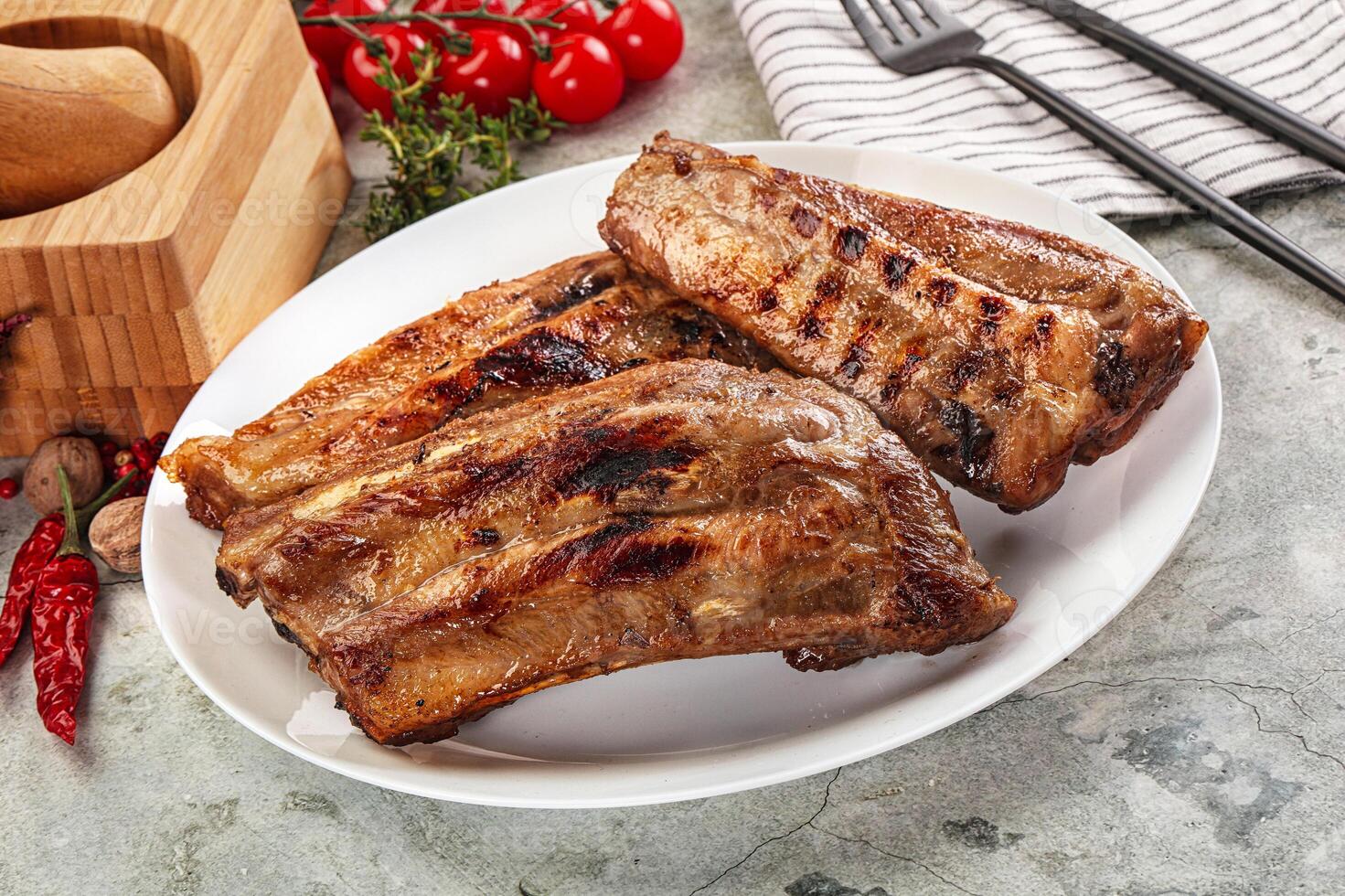Grilled pork ribs with spices photo