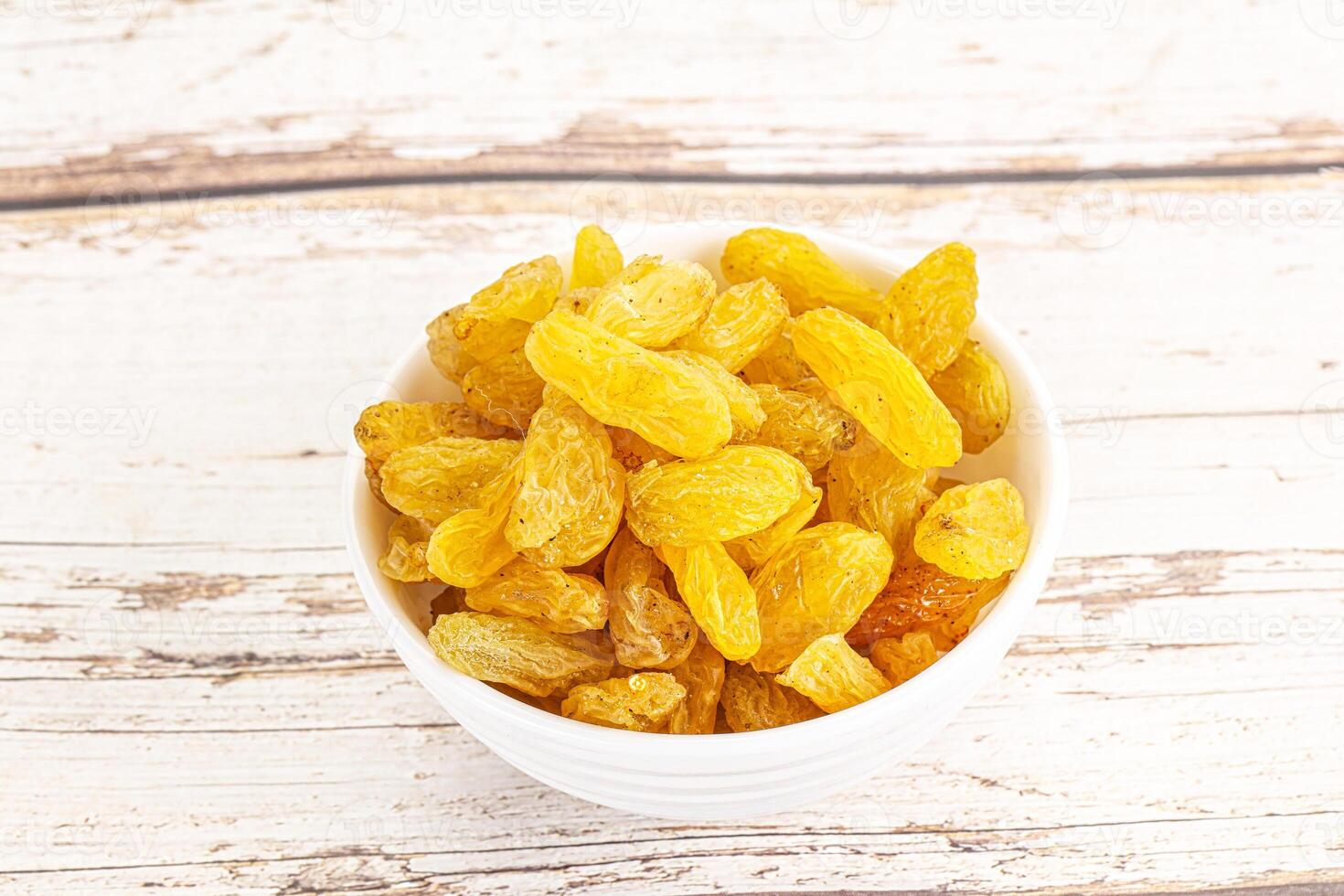Yellow raisin - dry grape berries photo