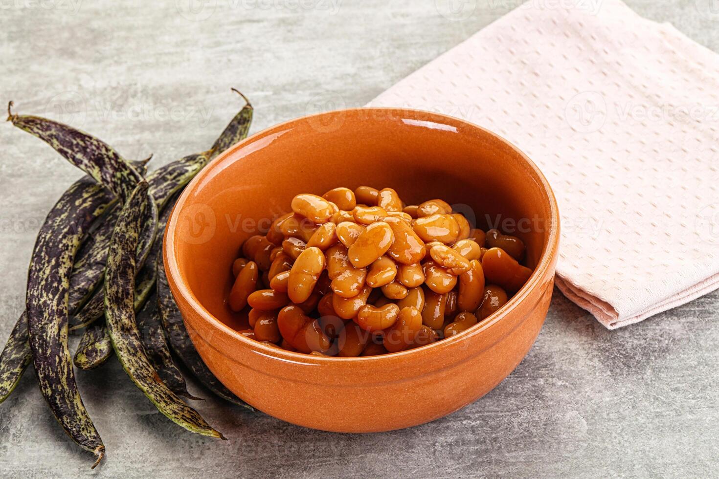 Canned white bean in tomato sauce photo