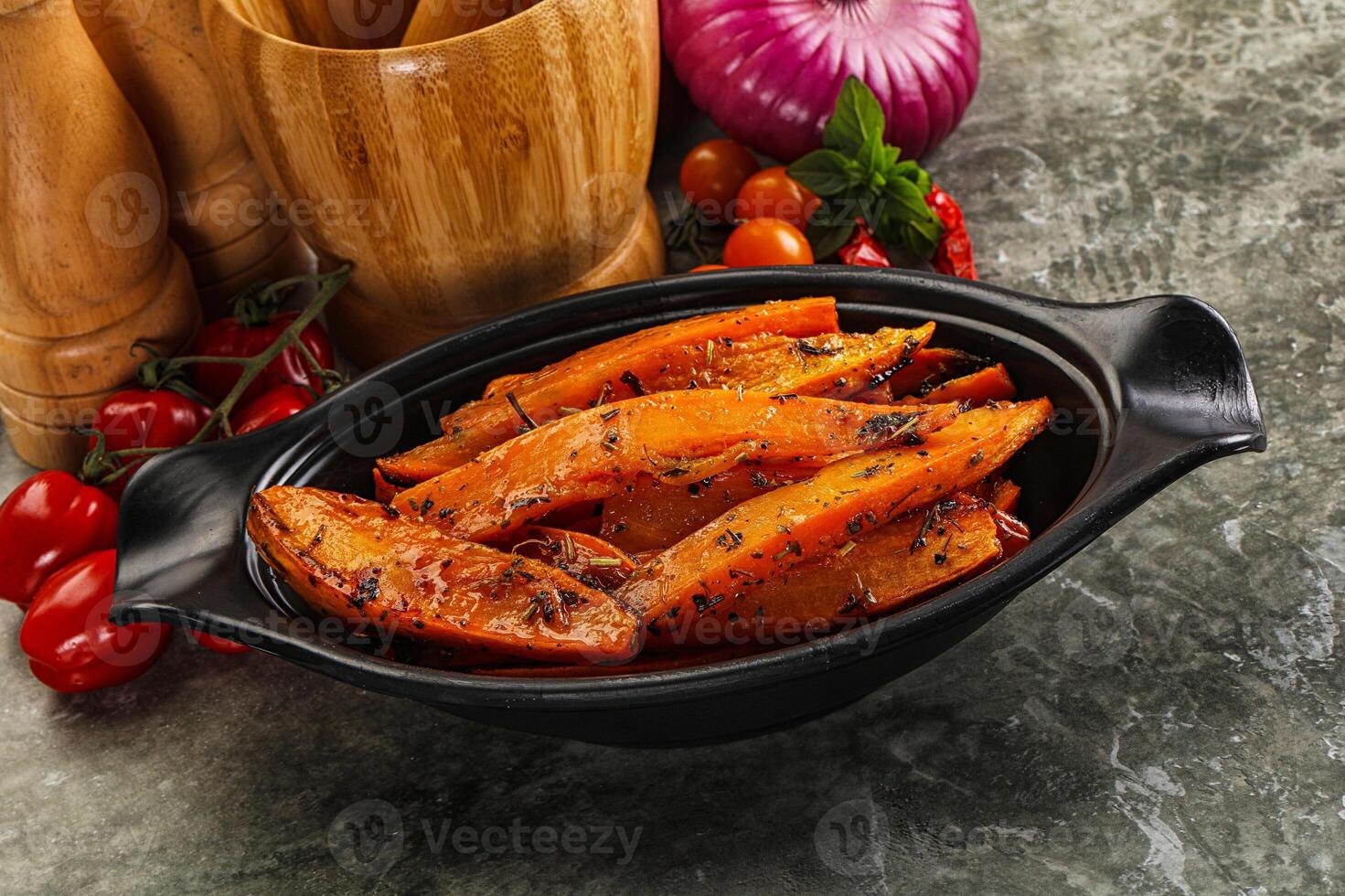 Baked batat with with spices photo