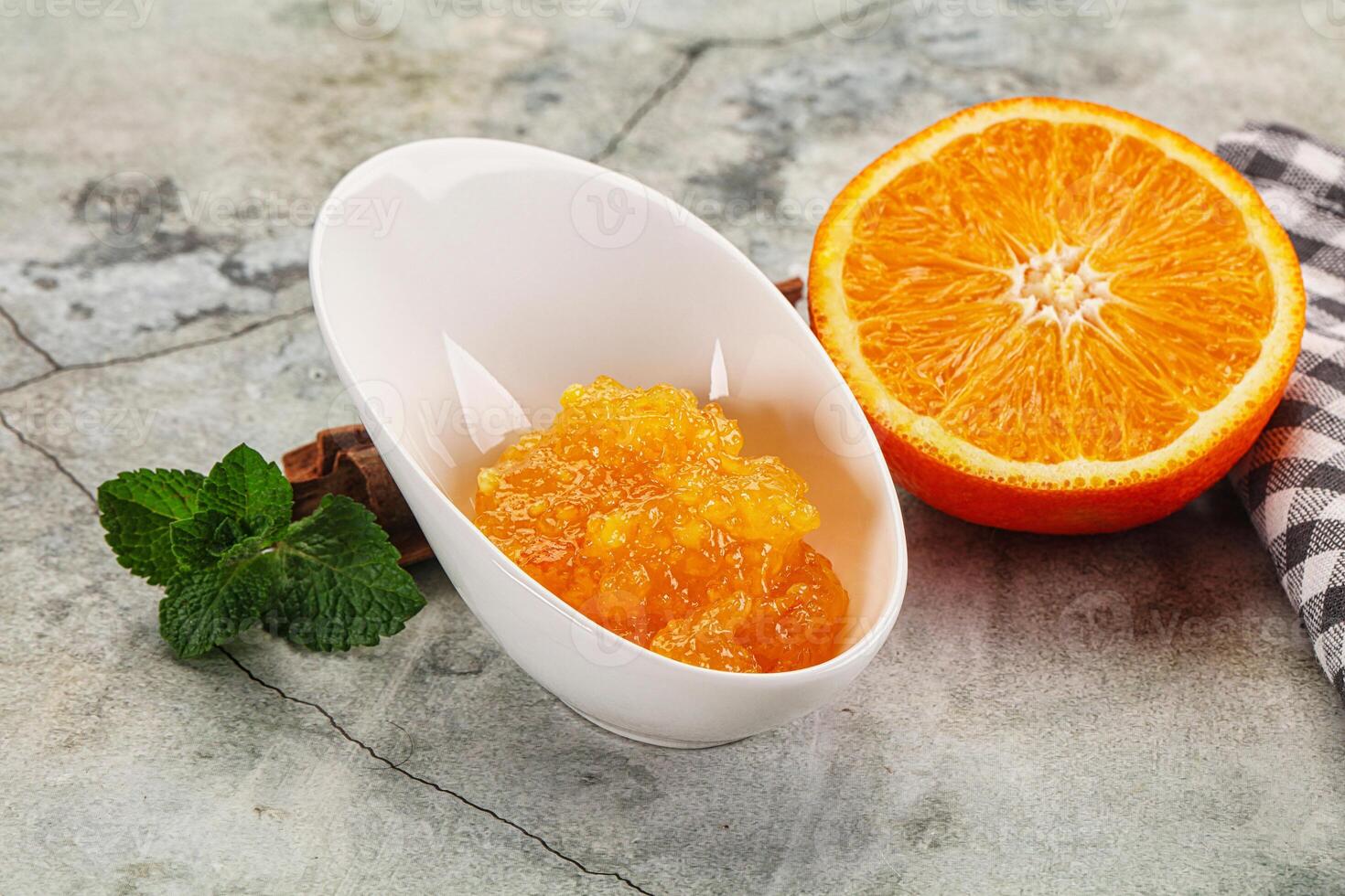 Tasty homemade Orange jam in the bowl photo
