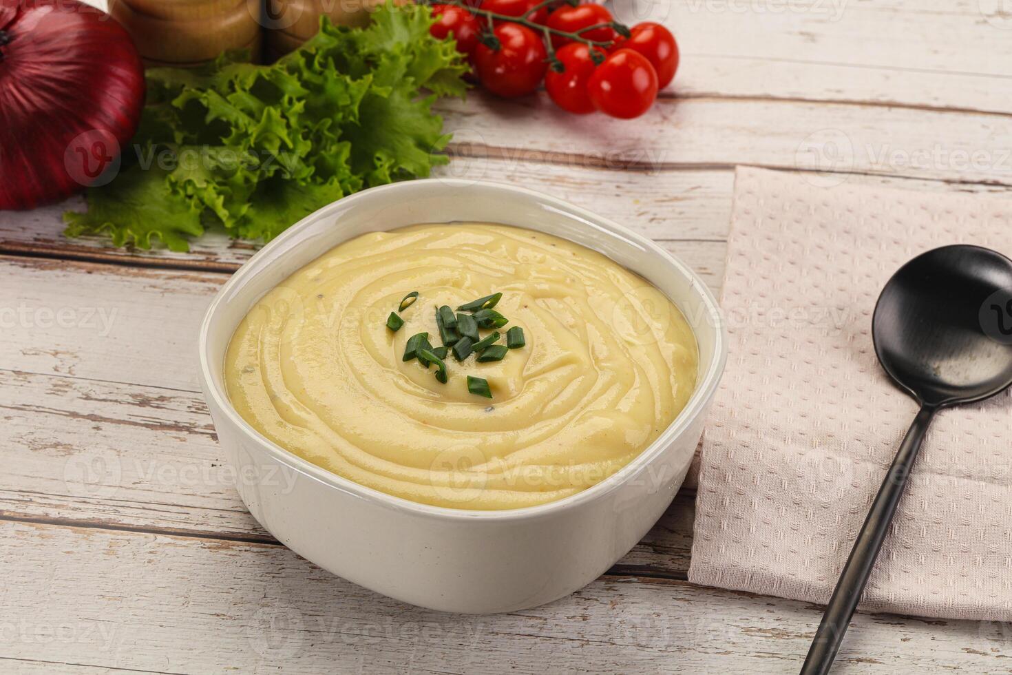 Gourmet cheese soup in the bowl photo