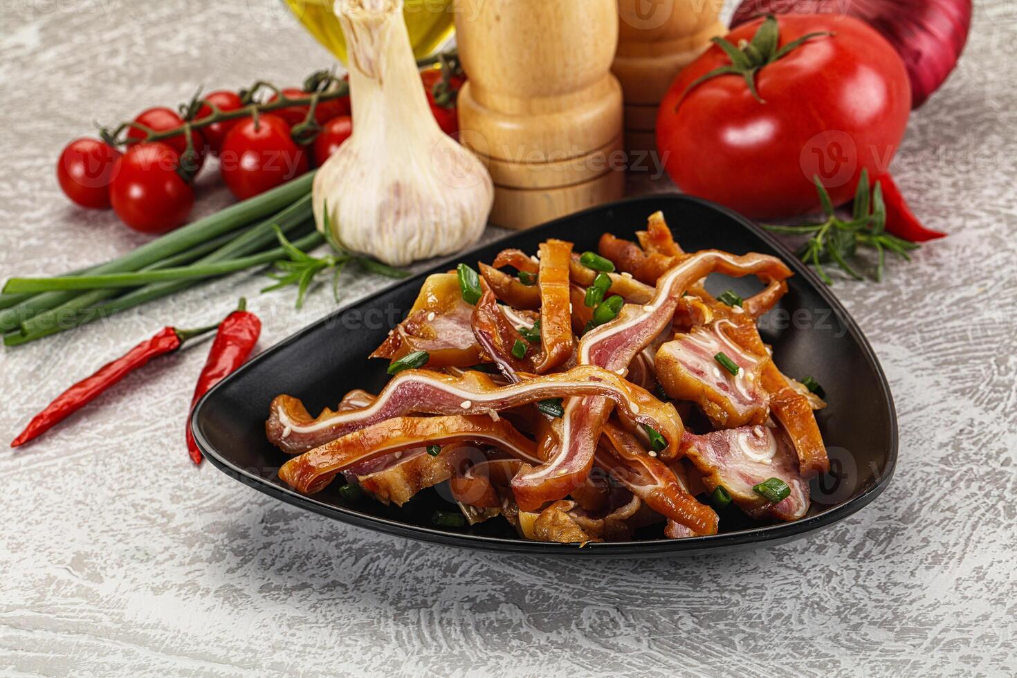 Sliced smoked pork ear snack photo