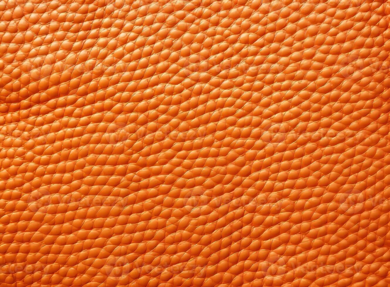 Close-up leather with a smooth, slightly uneven texture. photo