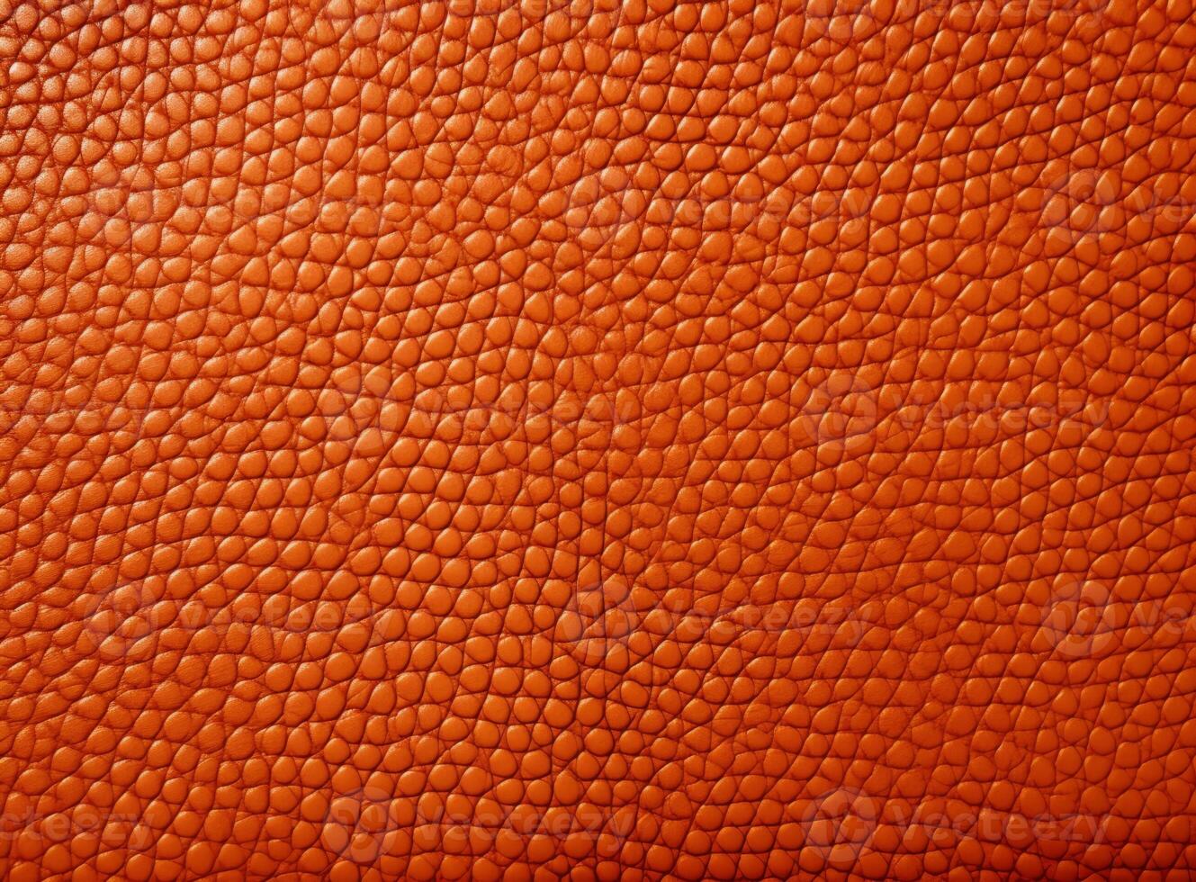 Close-up leather with a smooth, slightly uneven texture. photo