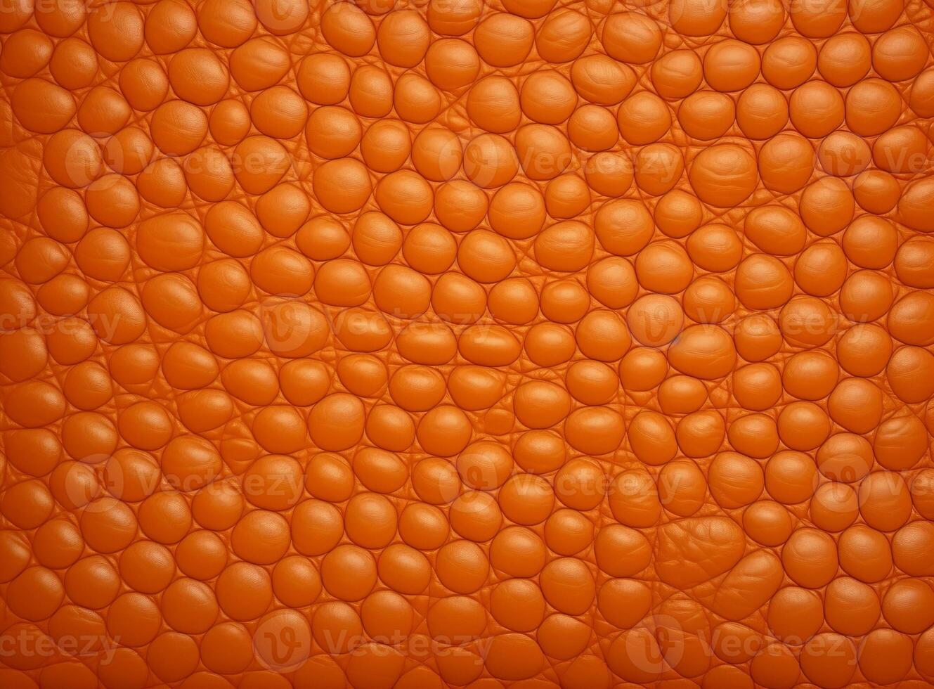 Close-up leather with a smooth, slightly uneven texture. photo