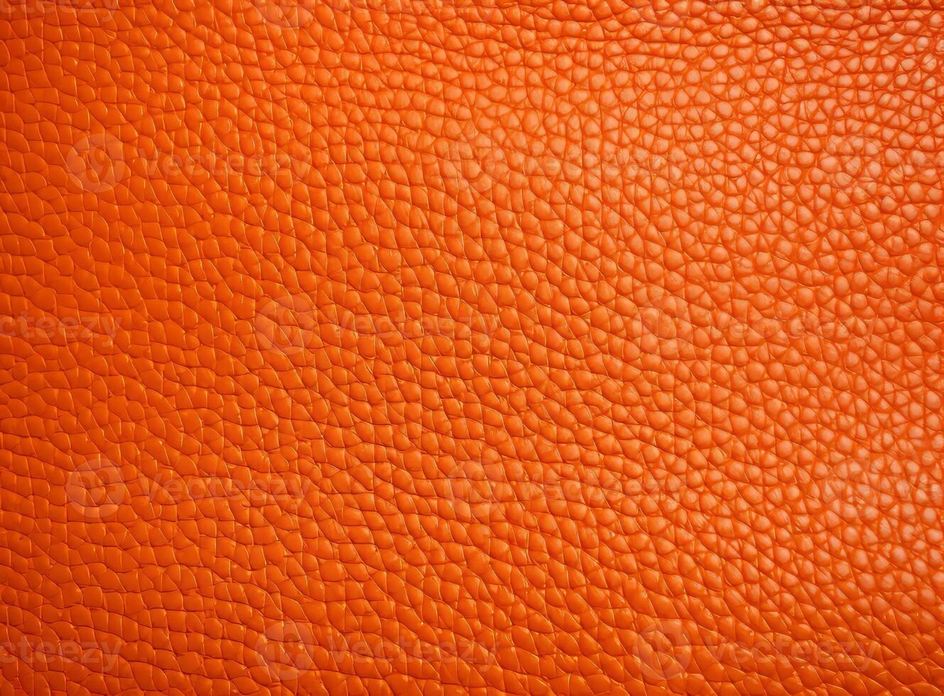 Close-up leather with a smooth, slightly uneven texture. photo