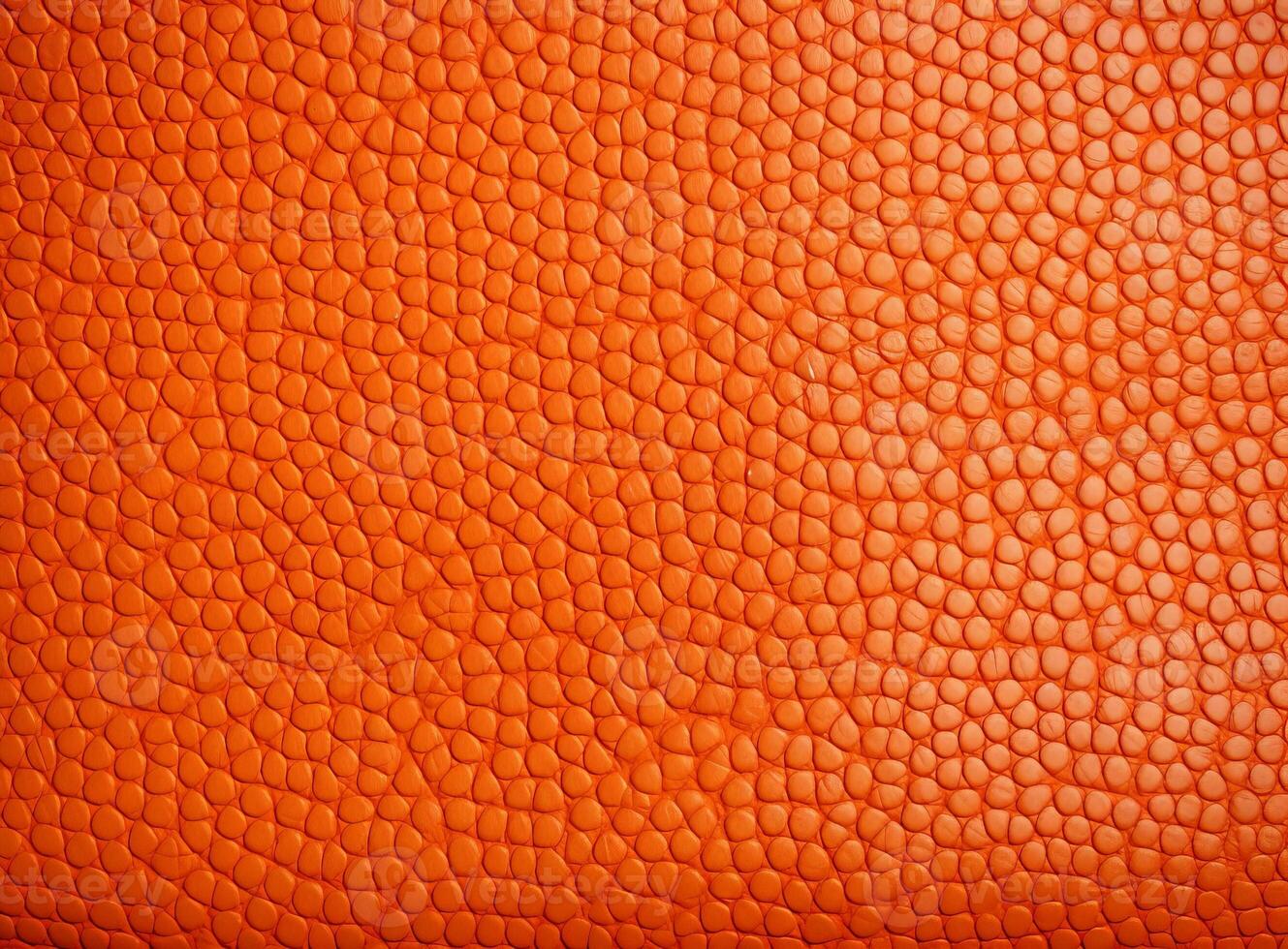 Close-up leather with a smooth, slightly uneven texture. photo