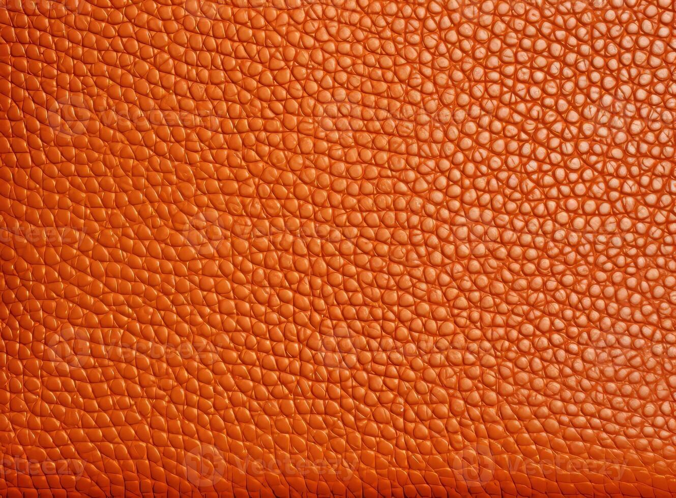Close-up leather with a smooth, slightly uneven texture. photo