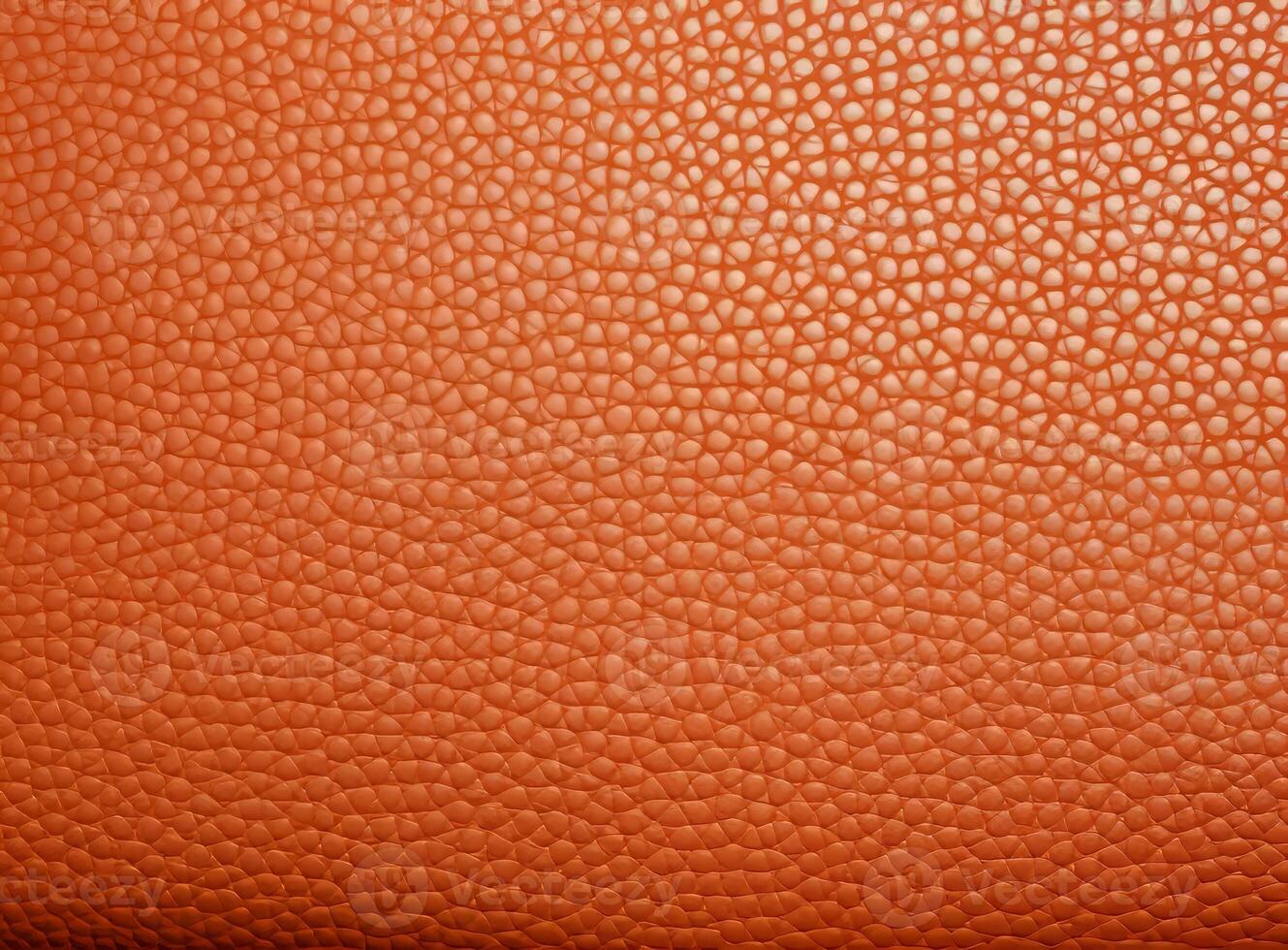Close-up leather with a smooth, slightly uneven texture. photo