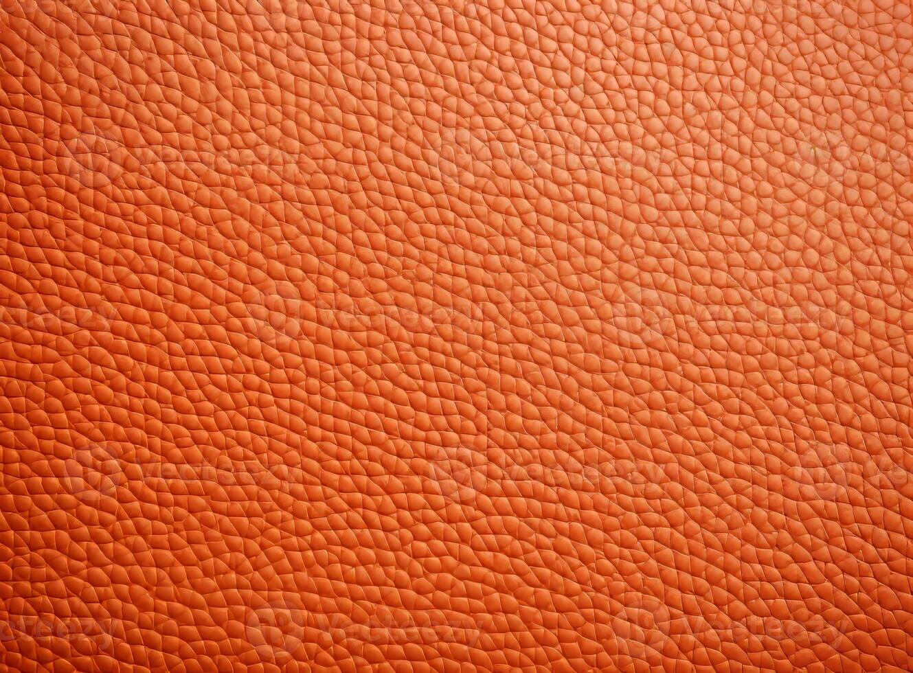 Close-up leather with a smooth, slightly uneven texture. photo