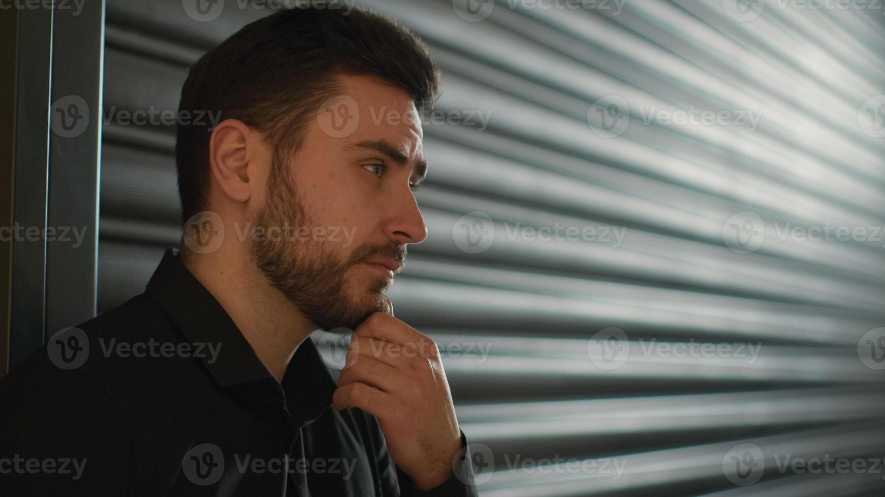 Thoughtful Caucasian man male businessman entrepreneur executive manager CEO employer think business idea ponder thoughts create plan solve problem looking aside thinking side view profile portrait photo