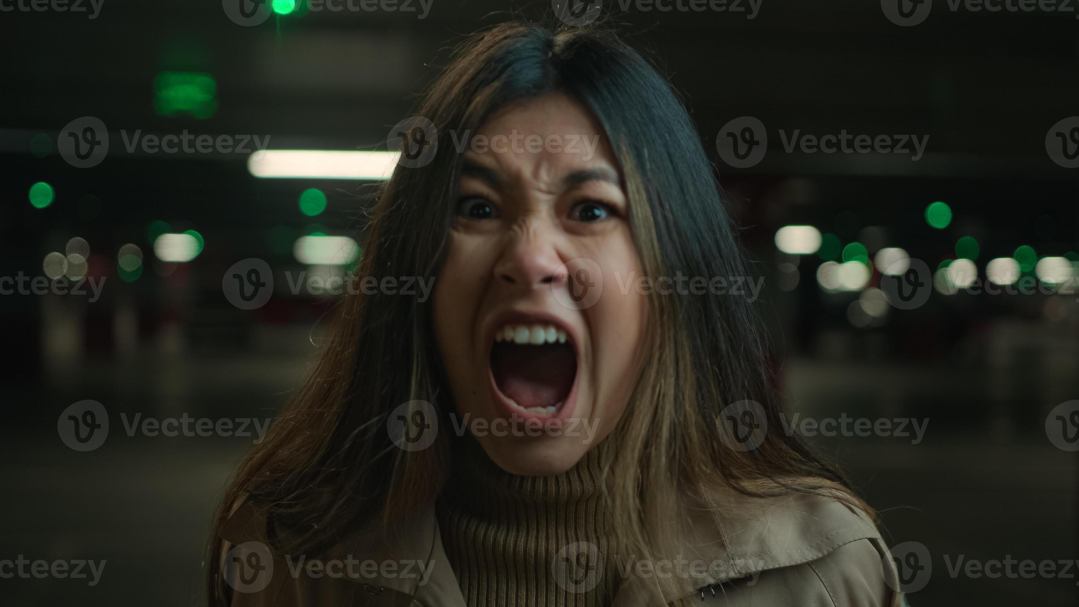 Mad angry crazy Asian korean chinese japanese girl shout in car parking 
