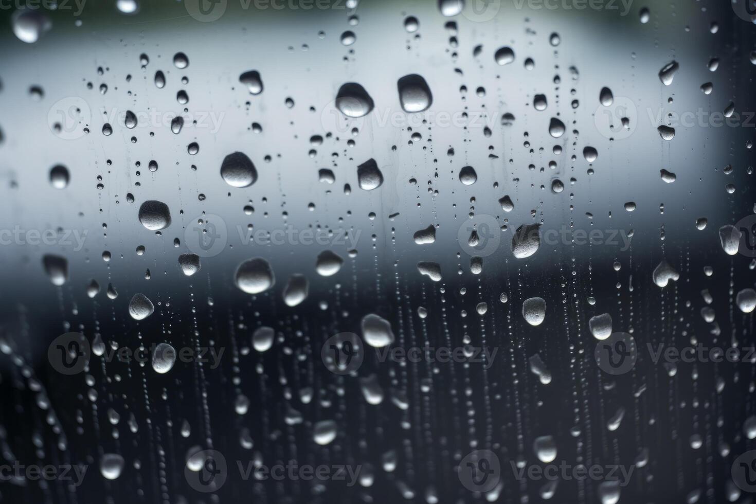 Shiny raindrops splashes falling cascading down wet glossy foggy glass window car outdoor during rainy stormy day backdrop. Close-up processes motion of beautiful clear fresh water photo