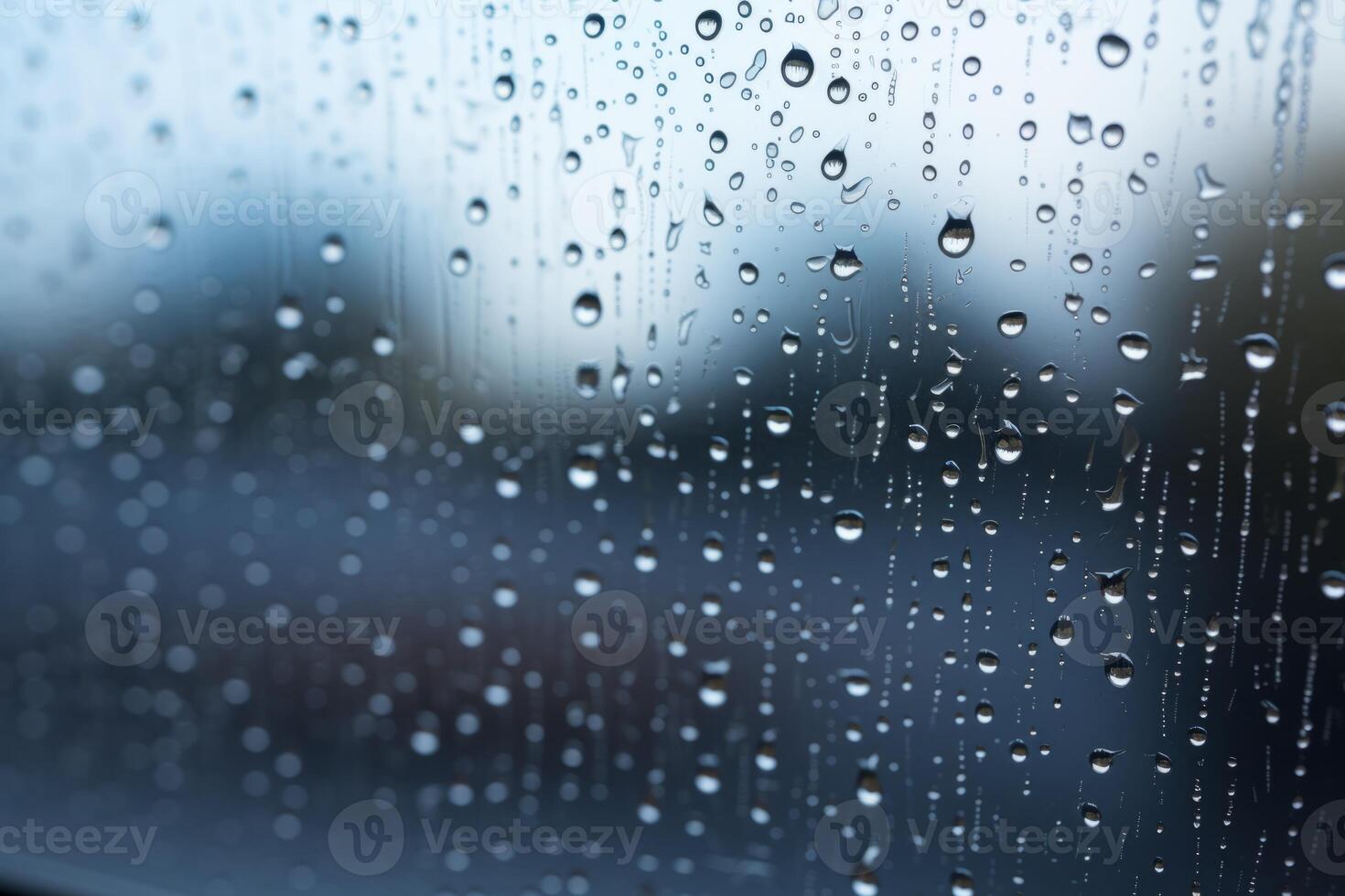 Shiny raindrops splashes falling cascading down wet glossy foggy glass window car outdoor during rainy stormy day backdrop. Close-up processes motion of beautiful clear fresh water photo